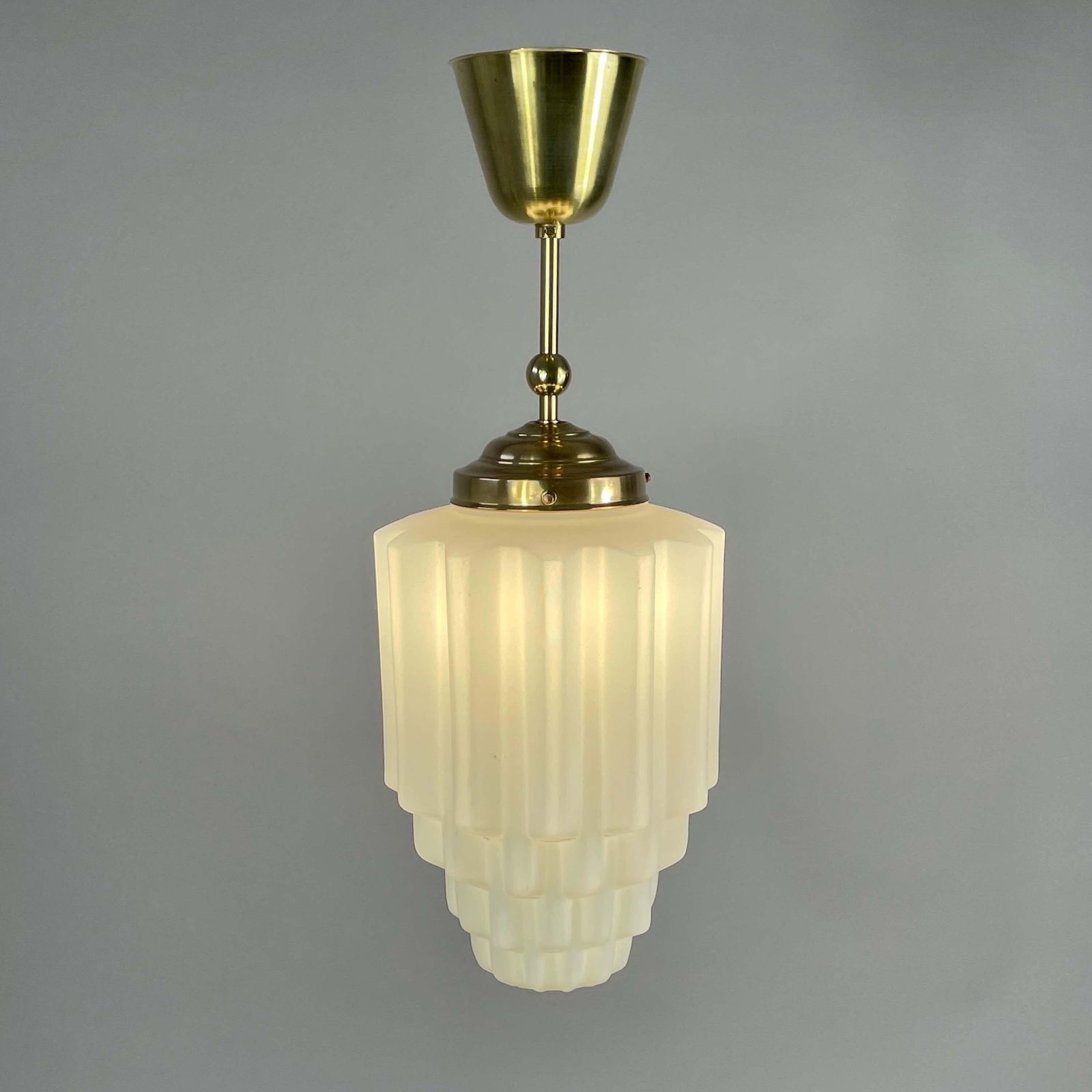 photo furniture Art Deco White Opaline Glass & Brass Skyscraper Pendant, France 1930s