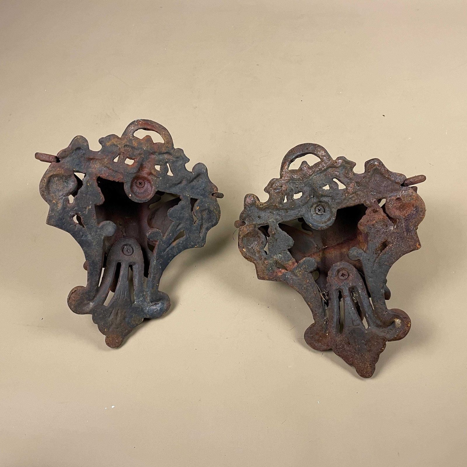 photo for sale Antique Cast Iron Wall Shelf Set Wall Plant Holder Bracket Ornate Rustic Male Face Figurative Ornament Weathered Heavy Victorian Style