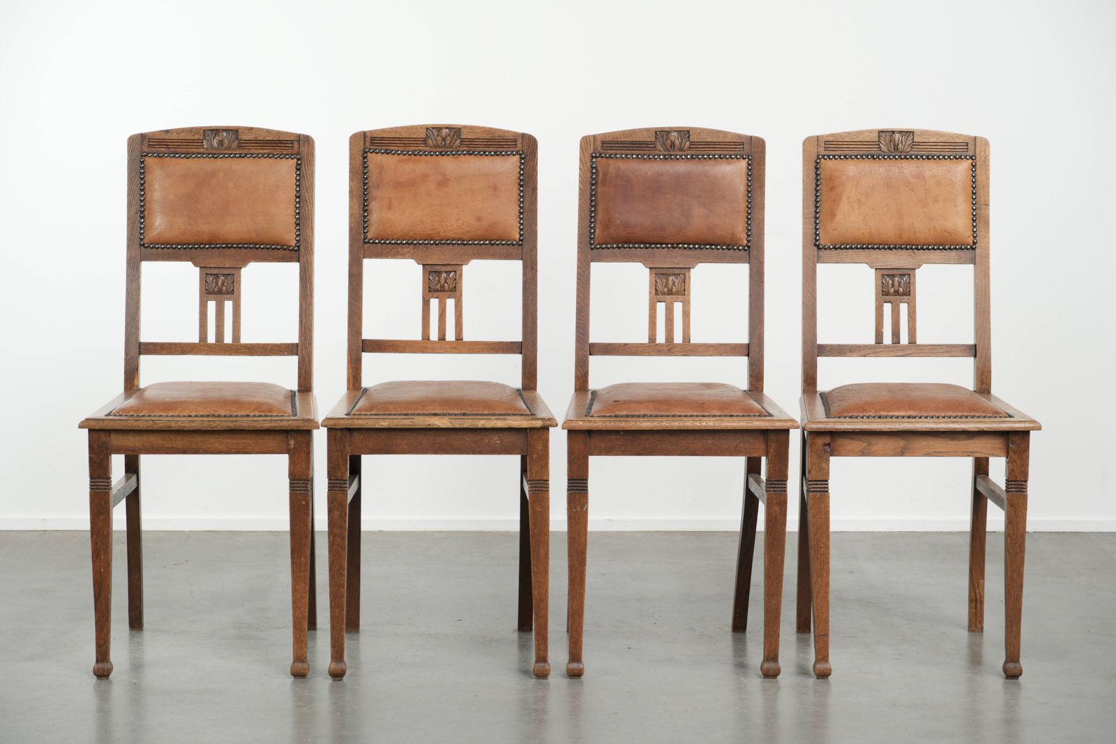 Set Van 4 Antieke Eiken Eetkamerstoelen In Art Nouveau Stijl Met Schapenvacht photo furniture