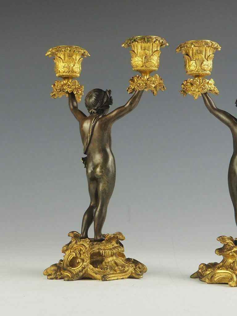 1850.0 Pair Of 19th Century Bronze And Ormolu Twin Light Cherub Candelabra photo