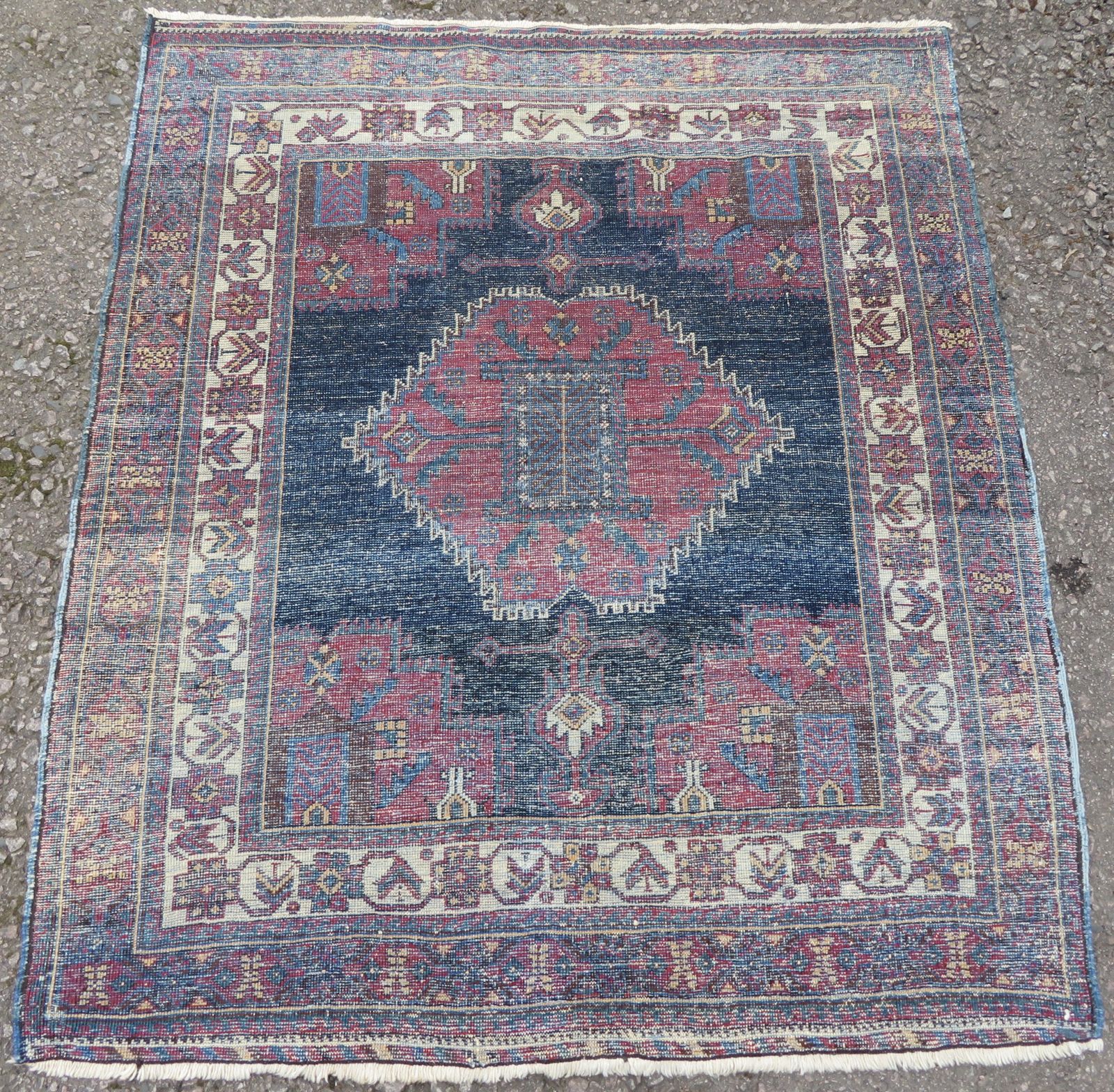 photo furniture Antique Tribal Rug. 132cm X 114cm.