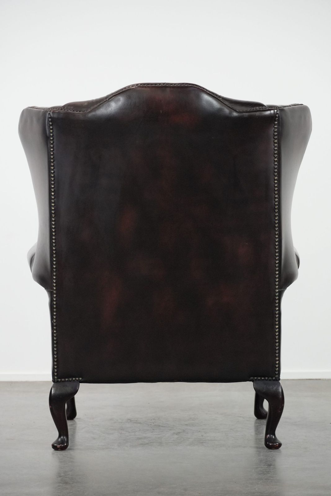 Beautiful, Luxurious, And Comfortable Brown Cowhide Chesterfield Wing Armchair In A Classic English Style. photo Furniture