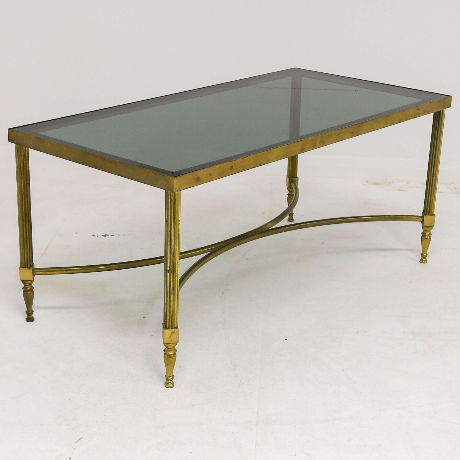 Mid 20th Century Hollywood Regency Brass And Smoked Glass Coffee Table photo for sale