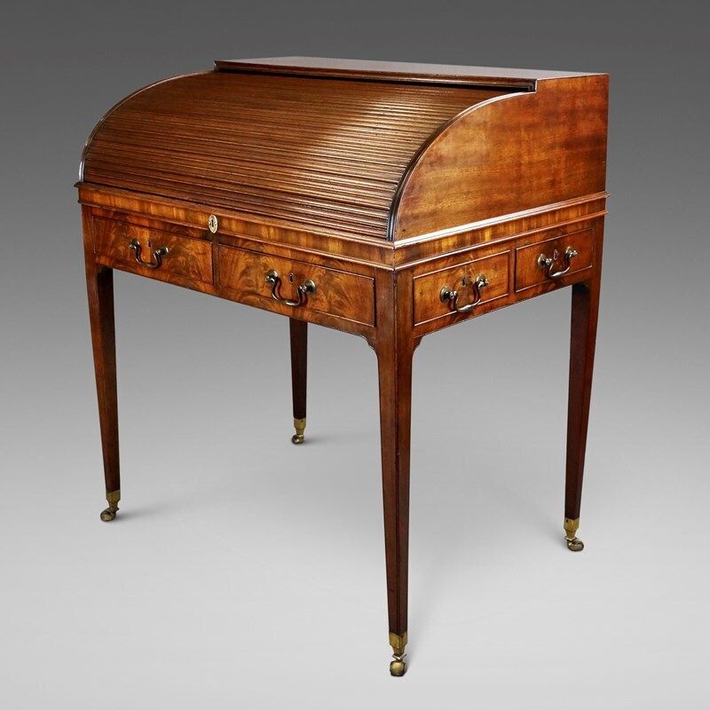 A Fine George III Flame Mahogany Roll Top Desk