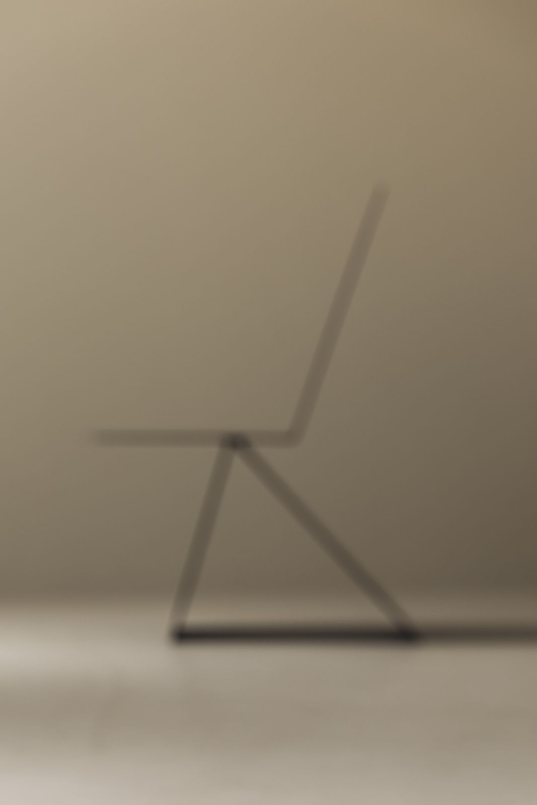 photo furniture Striking Modernist Metal Chair From The 1980s, Executed In Folded Sheet Steel.