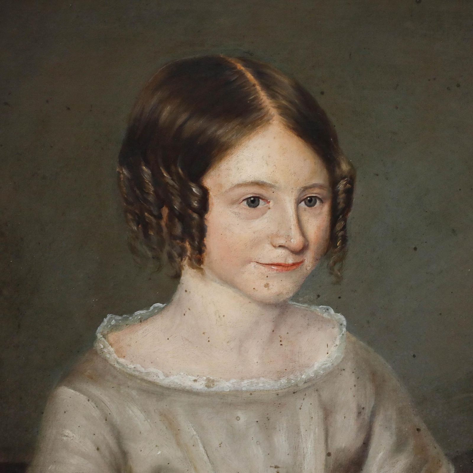 19th Century Oil Girl Holding Flowers photo 450.0