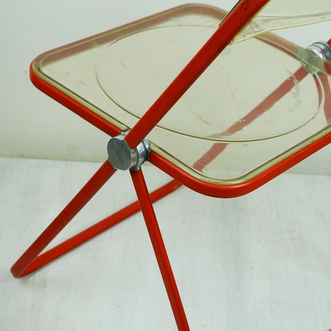 photo for sale Red Plia Lucite Folding Chair By G. Piretti For Castelli Italy