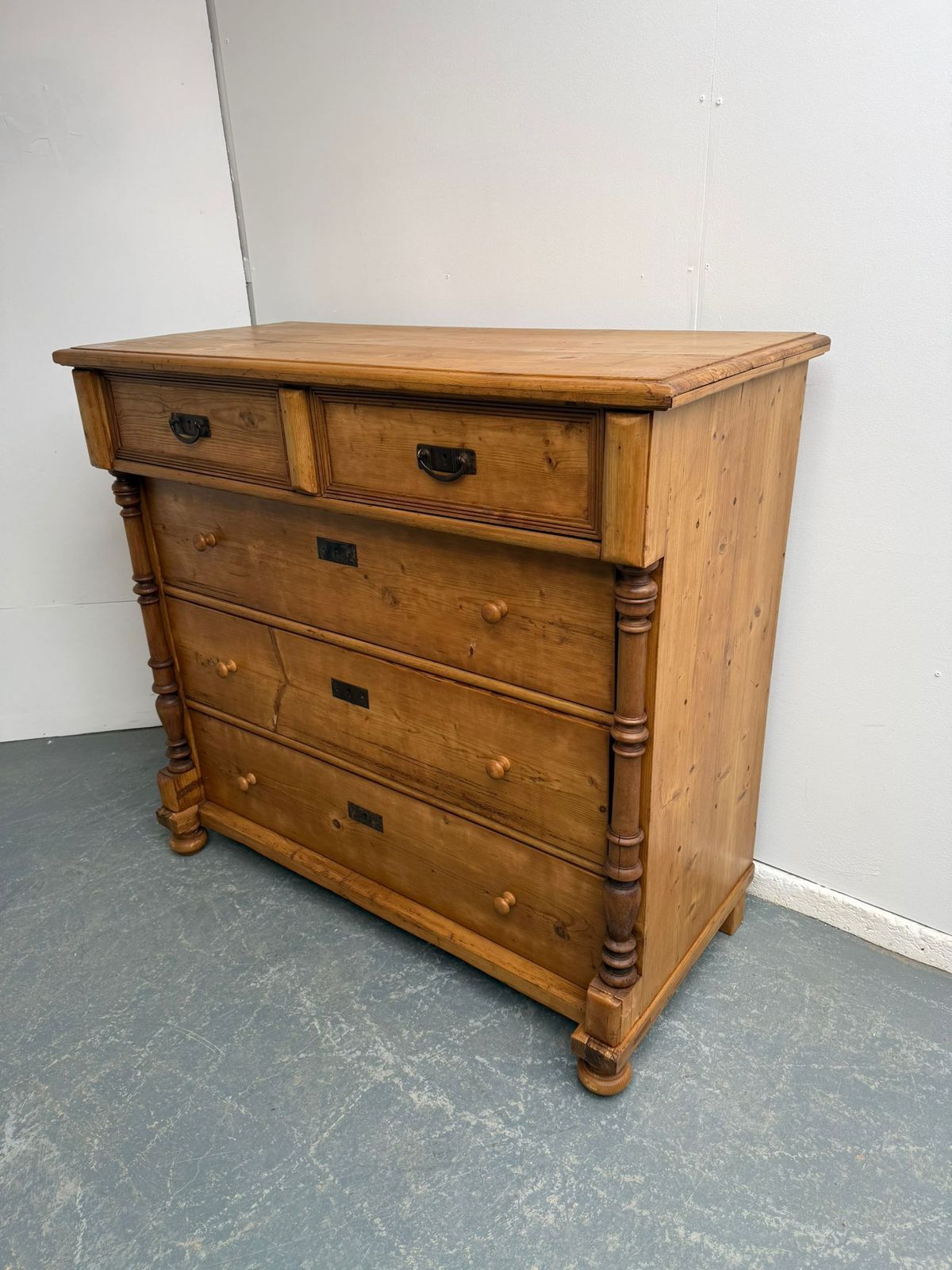 An Original Antique Pine Columned Hungarian Waxed 5 Drawer Chest Of Drawers