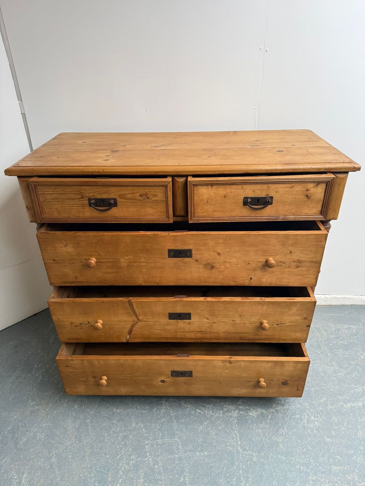 An Original Antique Pine Columned Hungarian Waxed 5 Drawer Chest Of Drawers photo vinterior