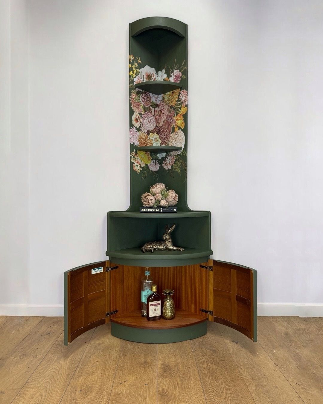 Refinished Mid Century Nathan Corner Cabinet In Deep Olive With Neutral Floral Design photo furniture