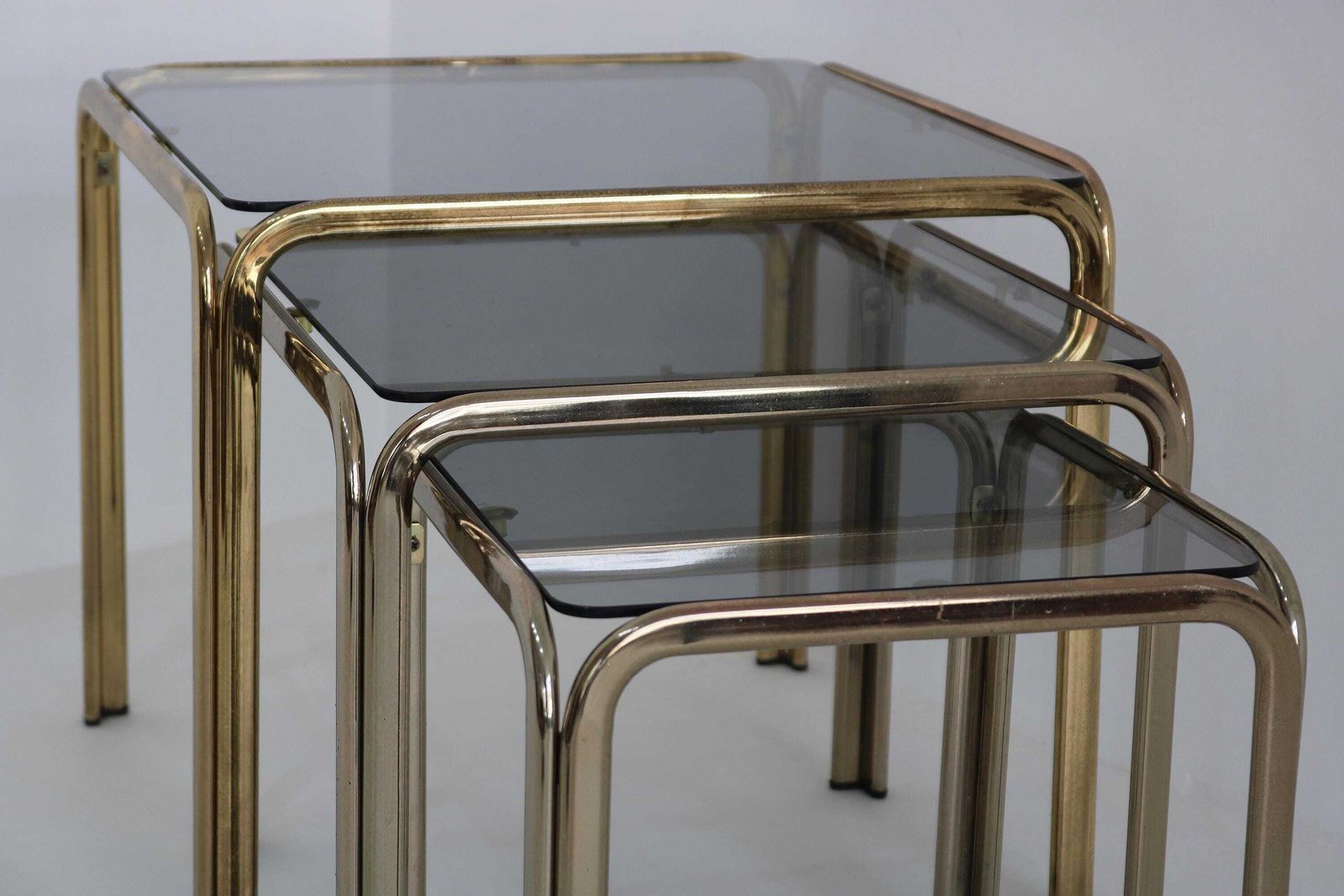 Vintage Mid Century Modern Smoked Glass Nesting Tables – Gold Brass Set Of 3 – Versatile Coffee & Side Tables – Retro Italian Design photo for sale