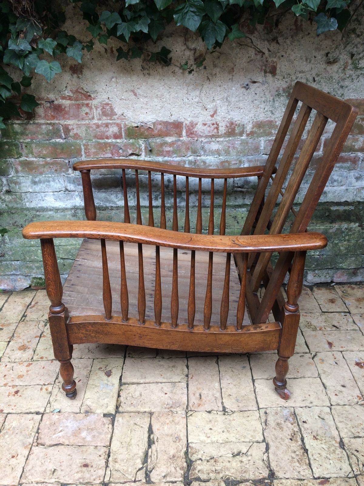 Arts And Crafts Oak Reclining Armchair By Wylie And Lochhead. photo for sale