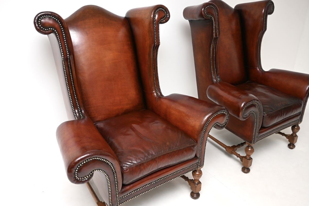 Pair Of Antique Leather Wing Back Armchairs photo 6045.0