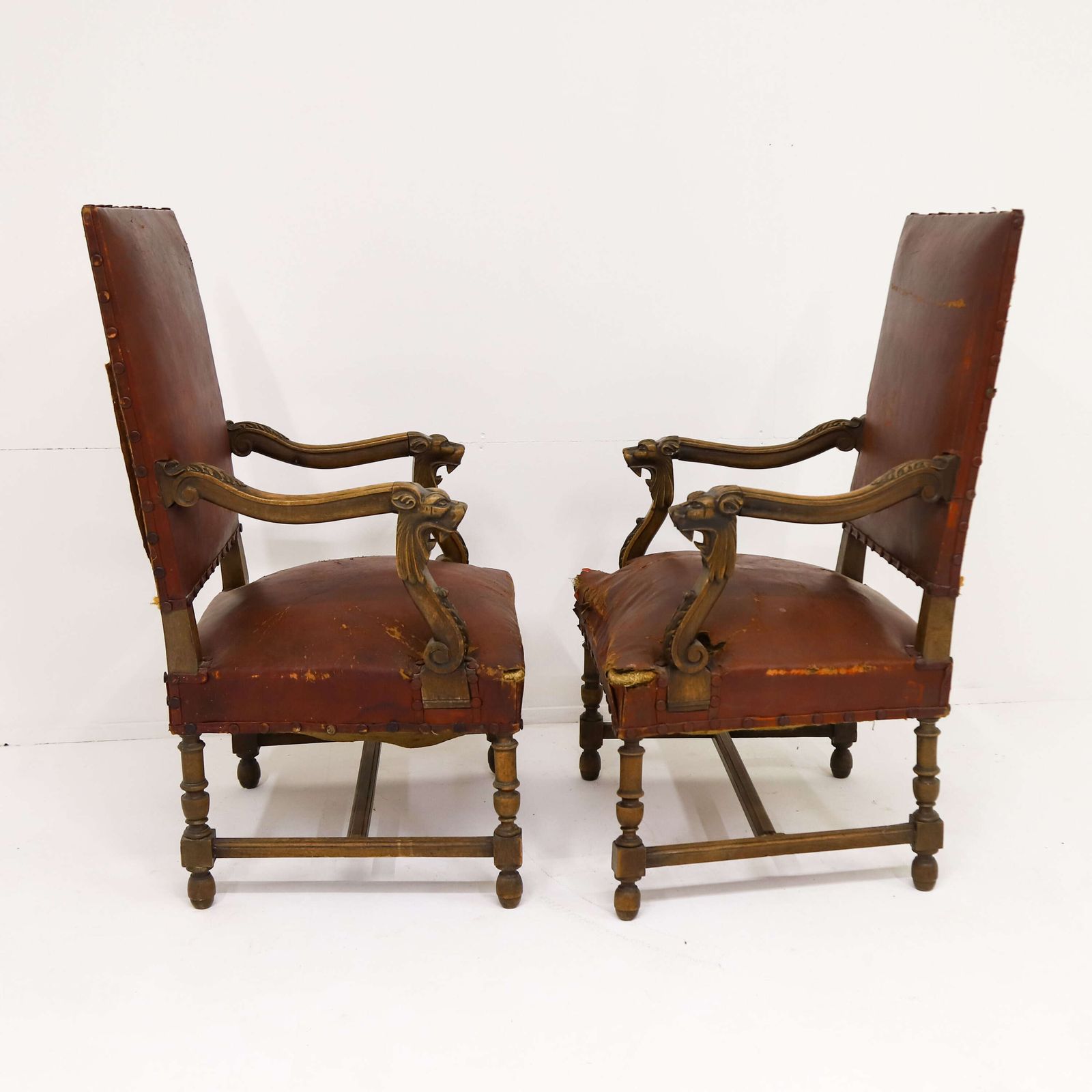 695.0 Pair Of French Louis XIV Style Mahogany Lion Head Fauteuils With Distressed Leather photo
