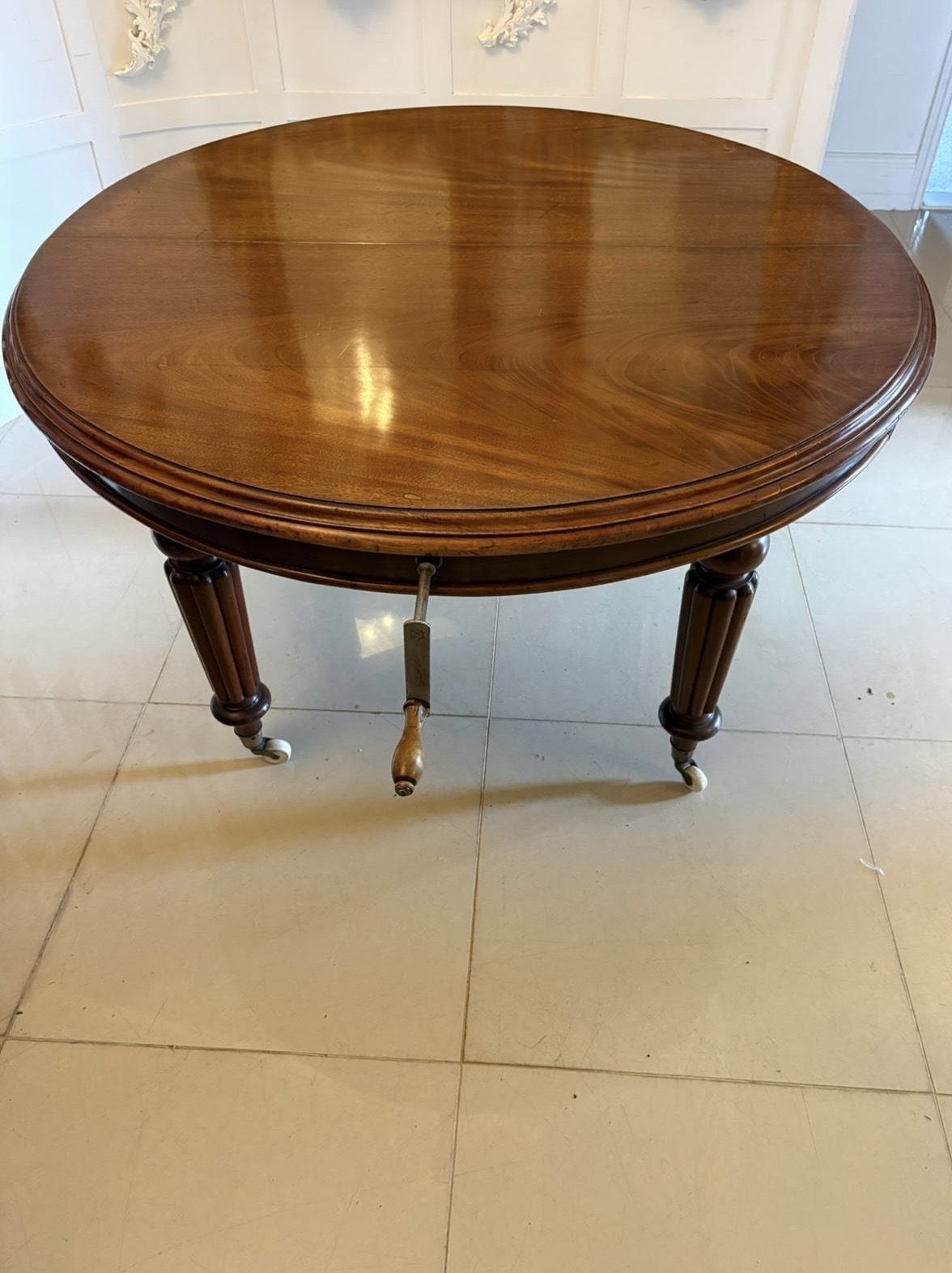 photo furniture Antique 19th Century Mahogany Extending Dining Table, Wind Out Oval On Castors