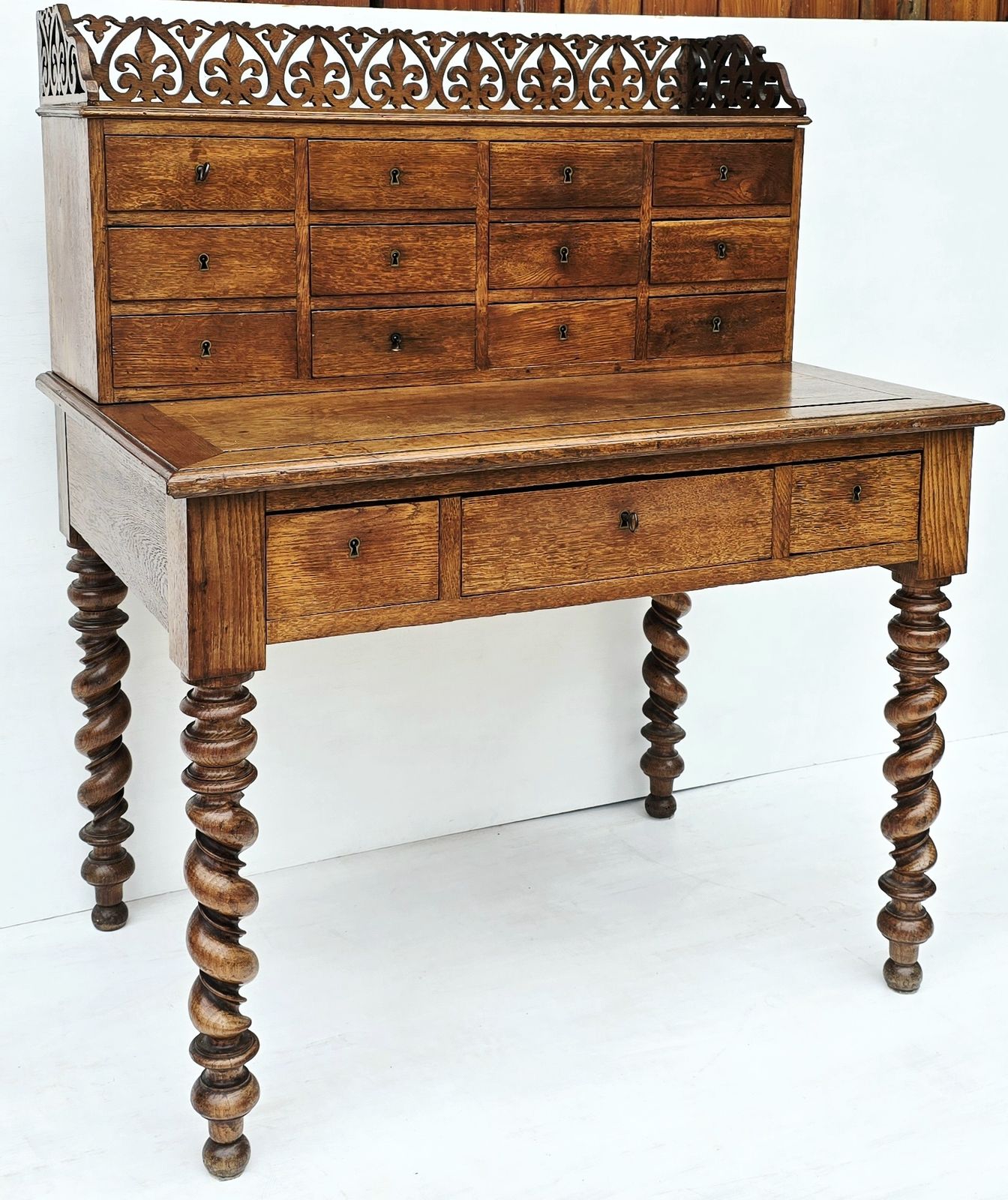 Antique French Oak Notaire's Desk With Bank Of Lockable Drawers & Carved Fretwork. photo furniture