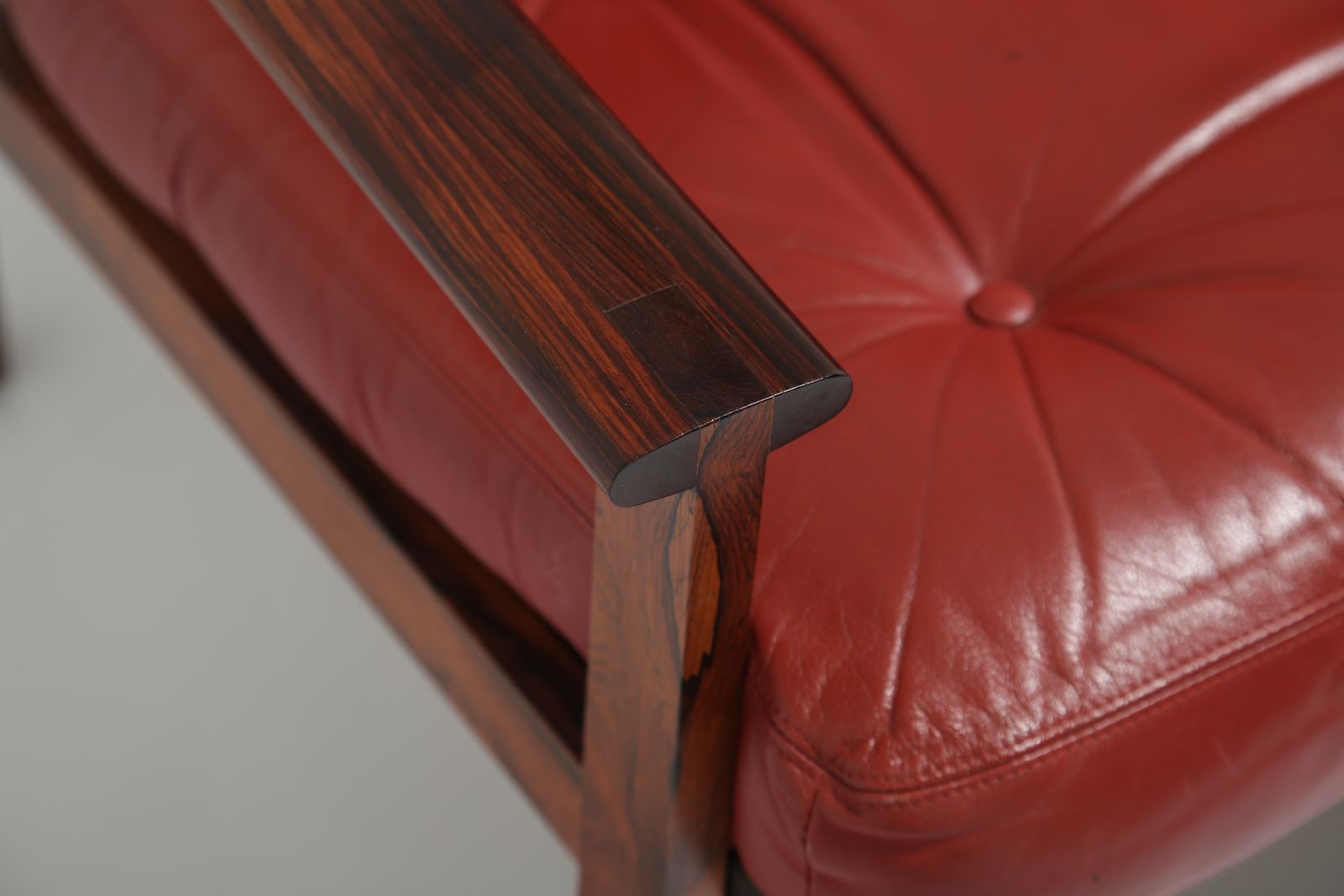 Illum Wikkelsø Figured Rosewood Sofa: Model ‘Capella’ Three Seater In Figured Rosewood & Red Leather For Niels Eilersen, Denmark, 1960s photo for sale