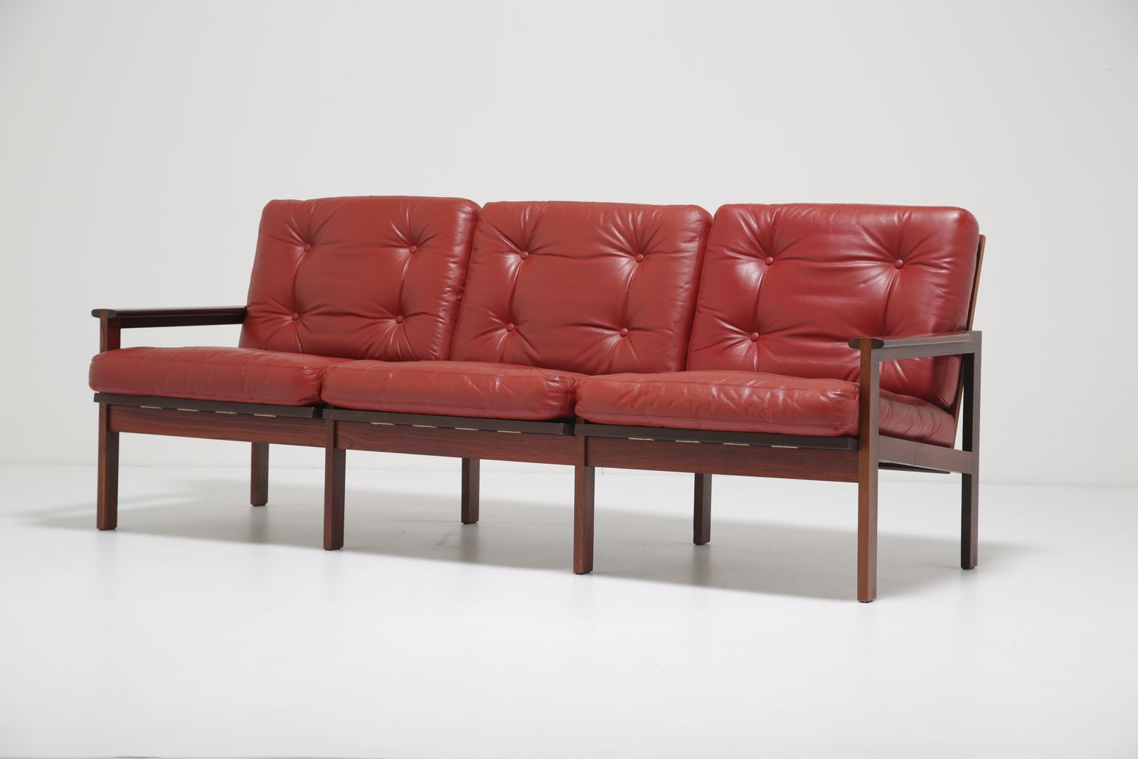 Illum Wikkelsø Figured Rosewood Sofa: Model ‘Capella’ Three Seater In Figured Rosewood & Red Leather For Niels Eilersen, Denmark, 1960s photo vinterior
