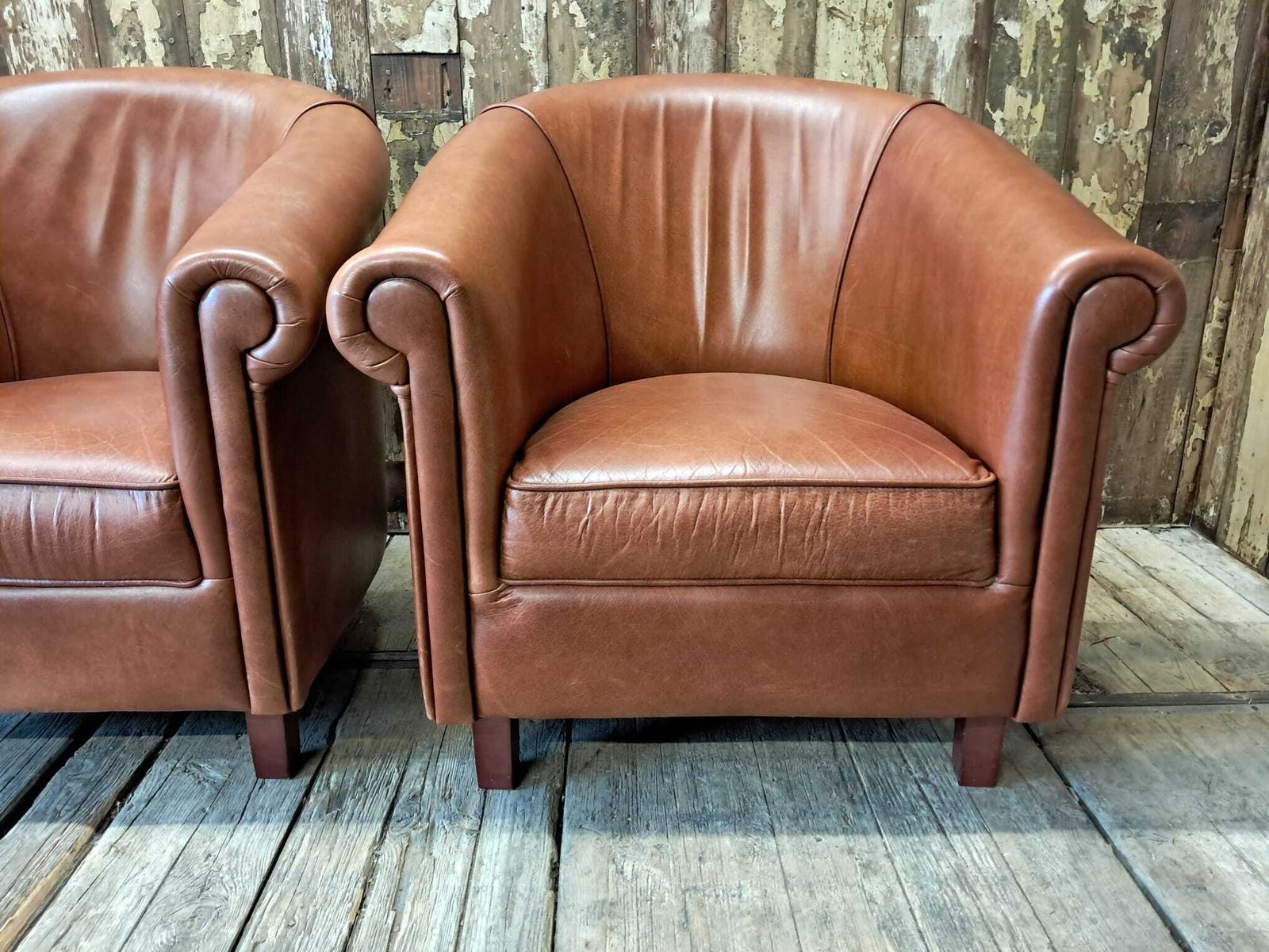 photo furniture Pair Of Leather Tub Chairs, 1980s