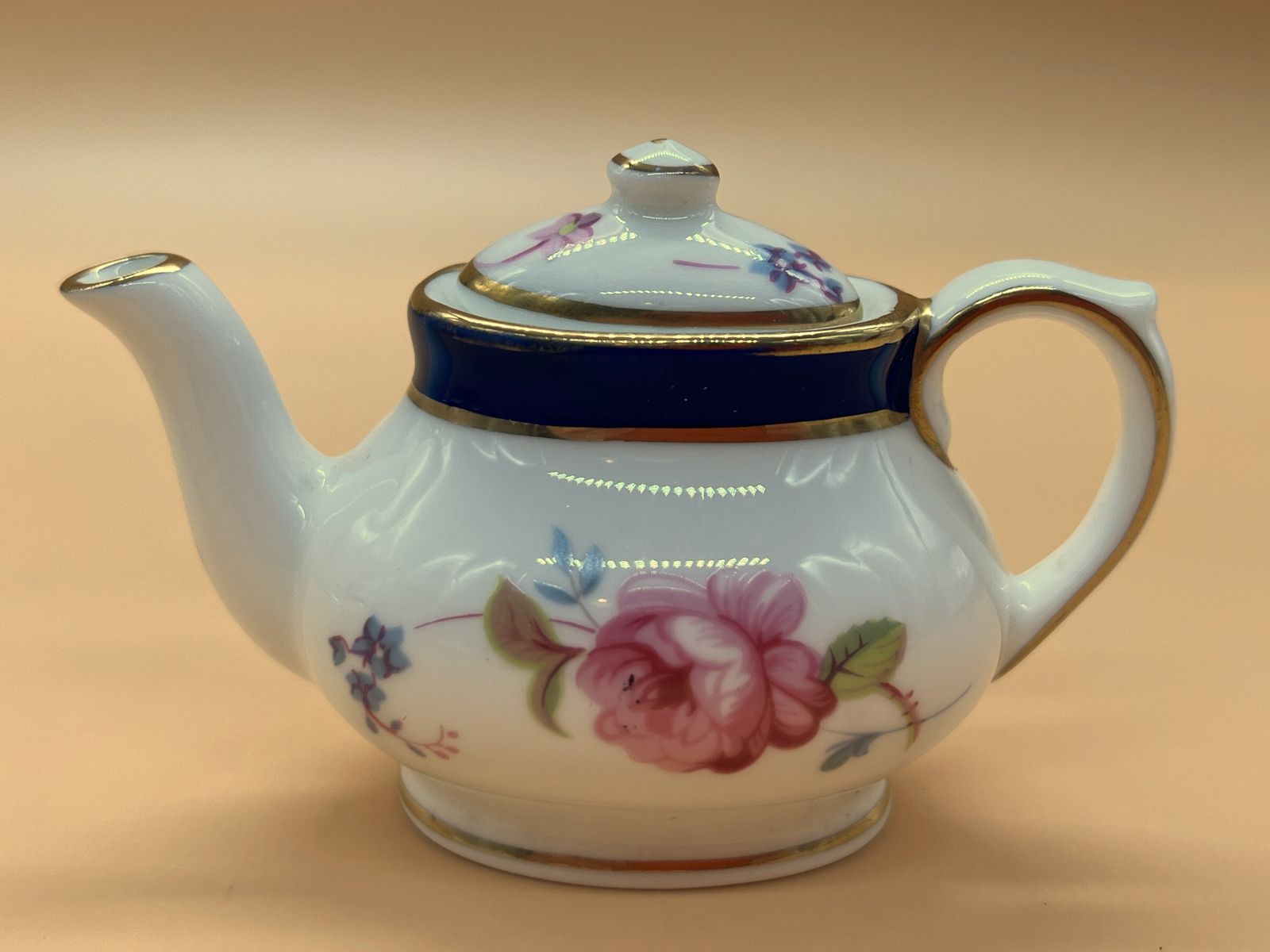Coalport China Titania Miniature Display Tea Set. Teapot, Creamer, Sugar, Tea Cup, Saucer & Side Plate Trio. photo furniture