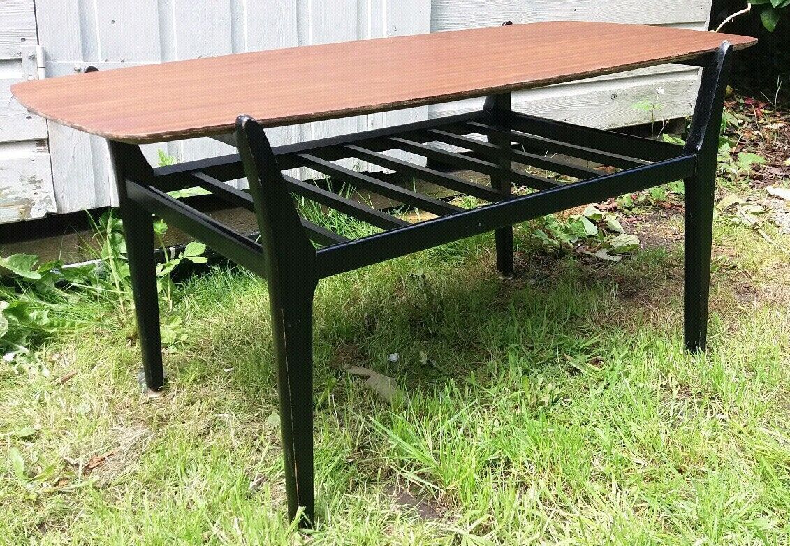 Mcm Nathan Ebonised Leg Tola Coffee Table With Magazine Rack