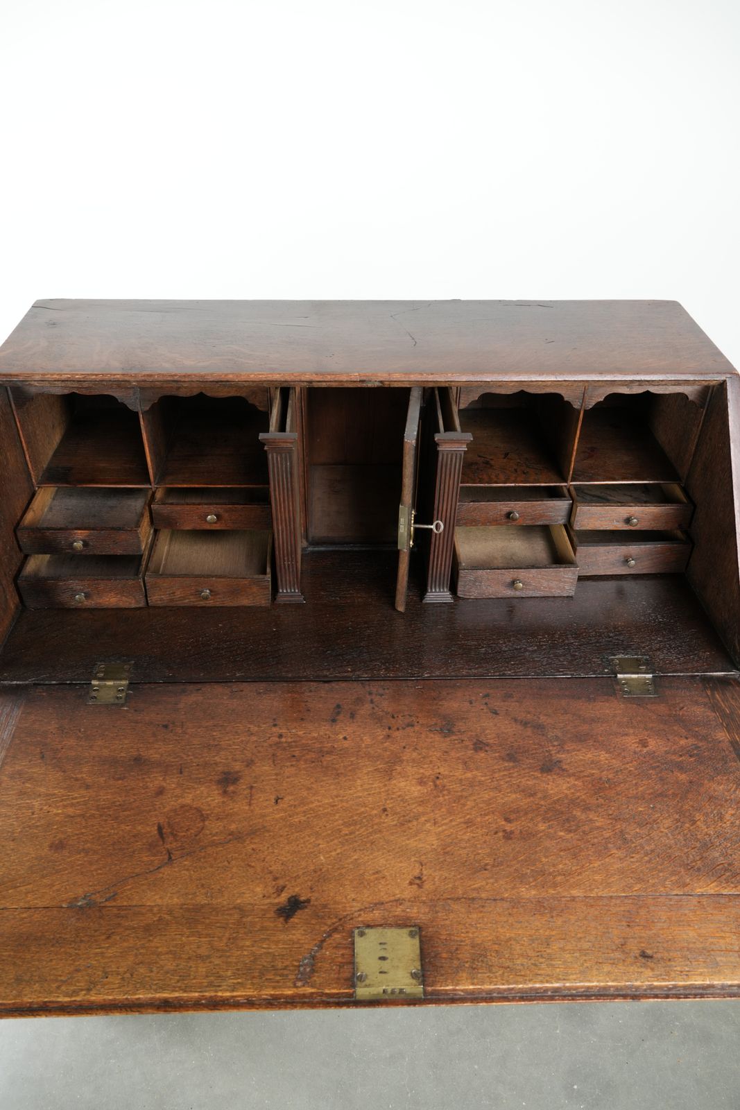 Beautiful Antique English Secretary Desk From The 18th Century Made Of Oak With Original Fittings And 6 Drawers. photo vintage