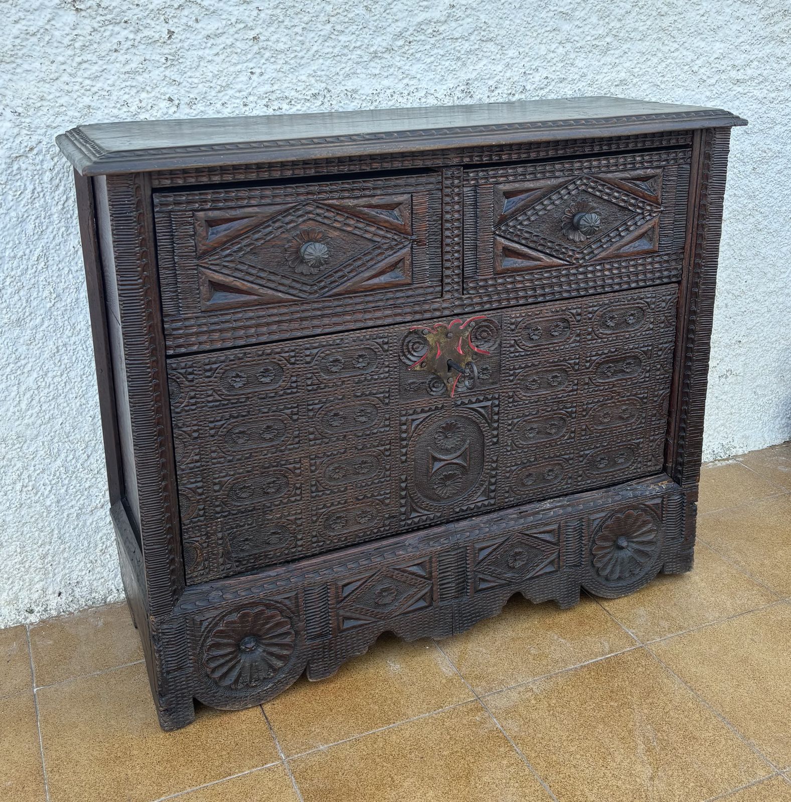 Furniture Spanish Renaissance Carved Cabinet With Drop Front Door And Two Drawers, 1880s photo