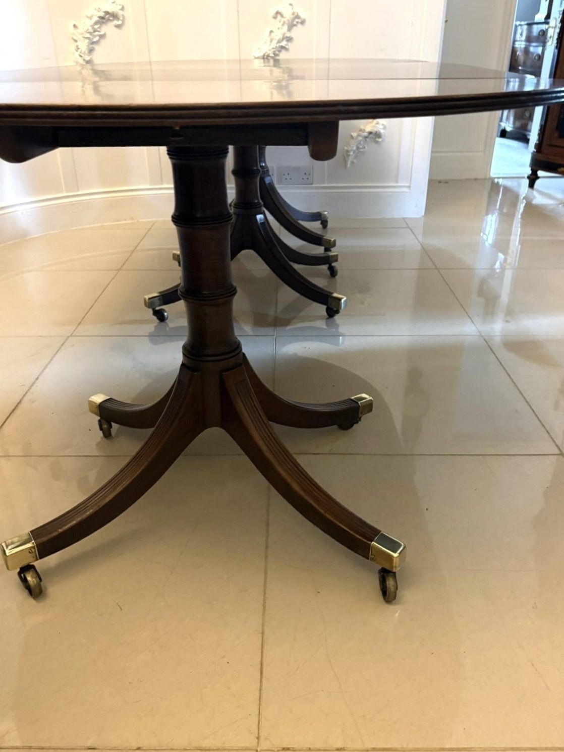 27000.0 Antique Mahogany Triple Pillar Dining Table 12–14 Seater Extending With Two Leaves photo