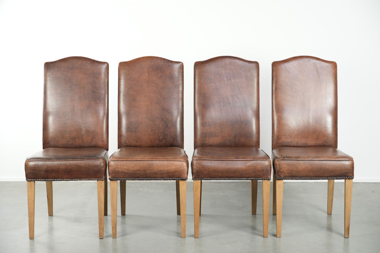 Characterful Vintage Set Of 4 Dining Chairs Made Of Sheepskin With A High Back photo furniture
