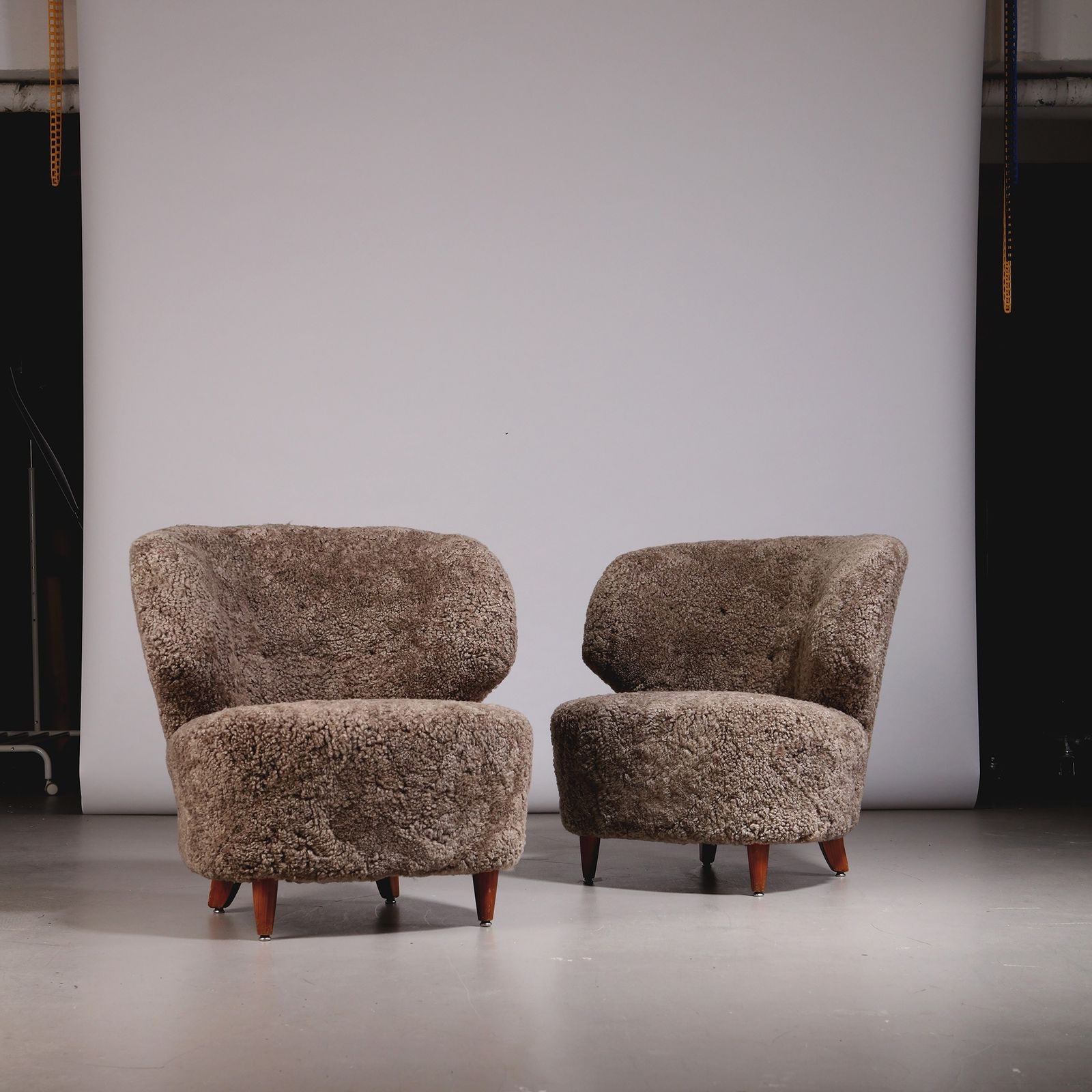 Carl Johan Boman Pair Of Finnish Curved Easy Chairs In Sahara Sheepskin, 1940s photo vinterior