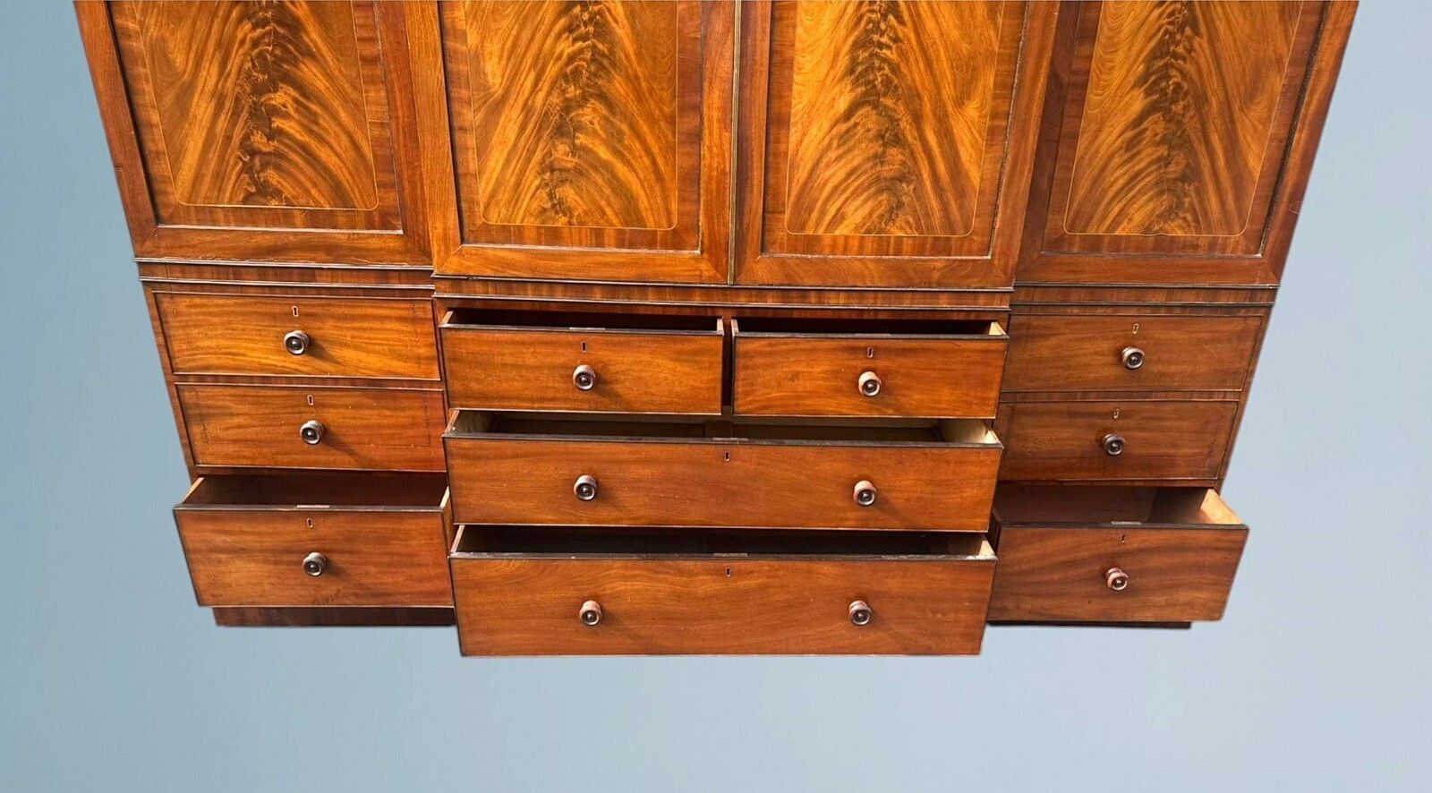 A Large Regency Figured Mahogany Breakfront Wardrobe With Brass Inlaid Decoratio photo vinterior