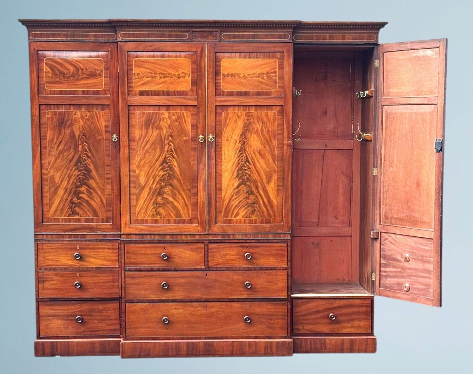 A Large Regency Figured Mahogany Breakfront Wardrobe With Brass Inlaid Decoratio photo buy
