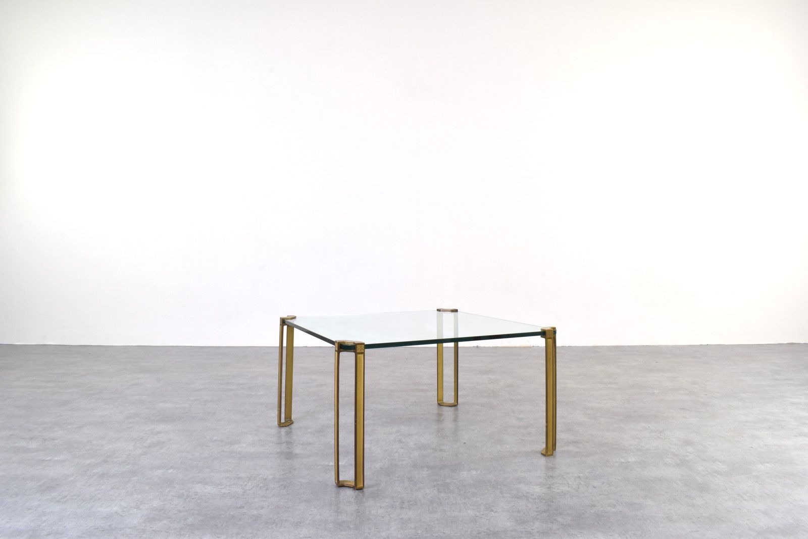Hollywood Regency Brass And Glass Coffee Table By Peter Ghyczy, 1970s.