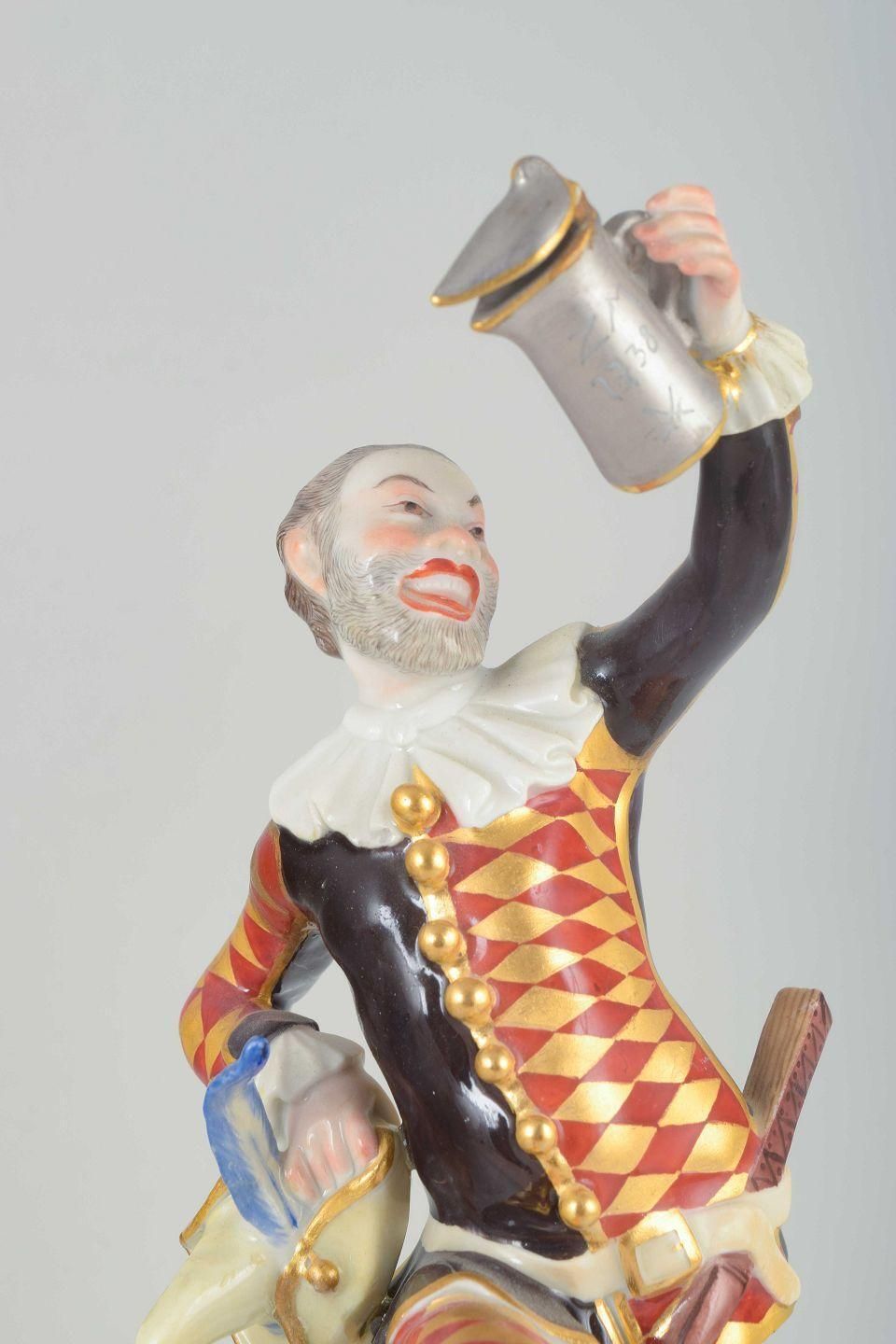 Meissen. Porcelain Figure Of “Harlequin” In A Classic Commedia Dell’arte Costume photo furniture