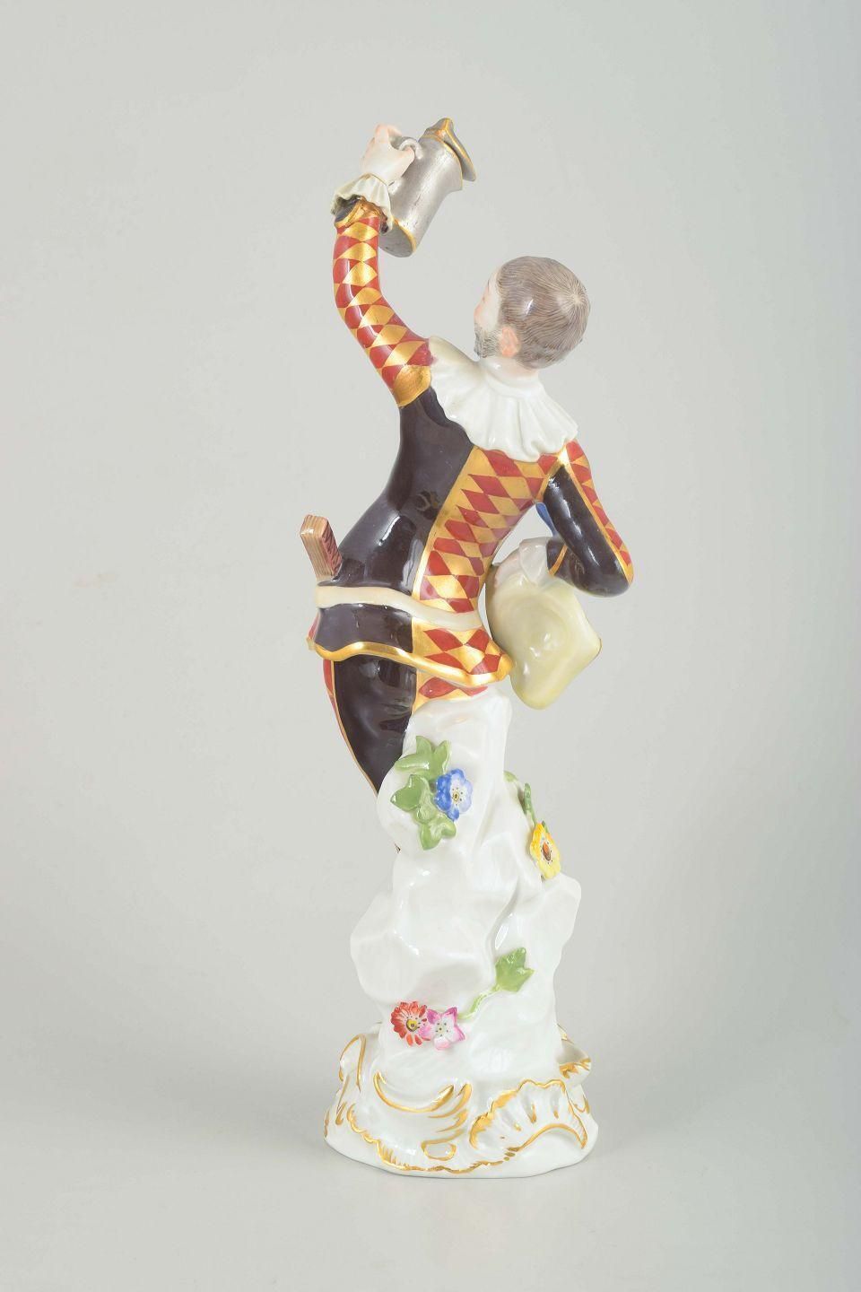 Meissen. Porcelain Figure Of “Harlequin” In A Classic Commedia Dell’arte Costume photo vinterior