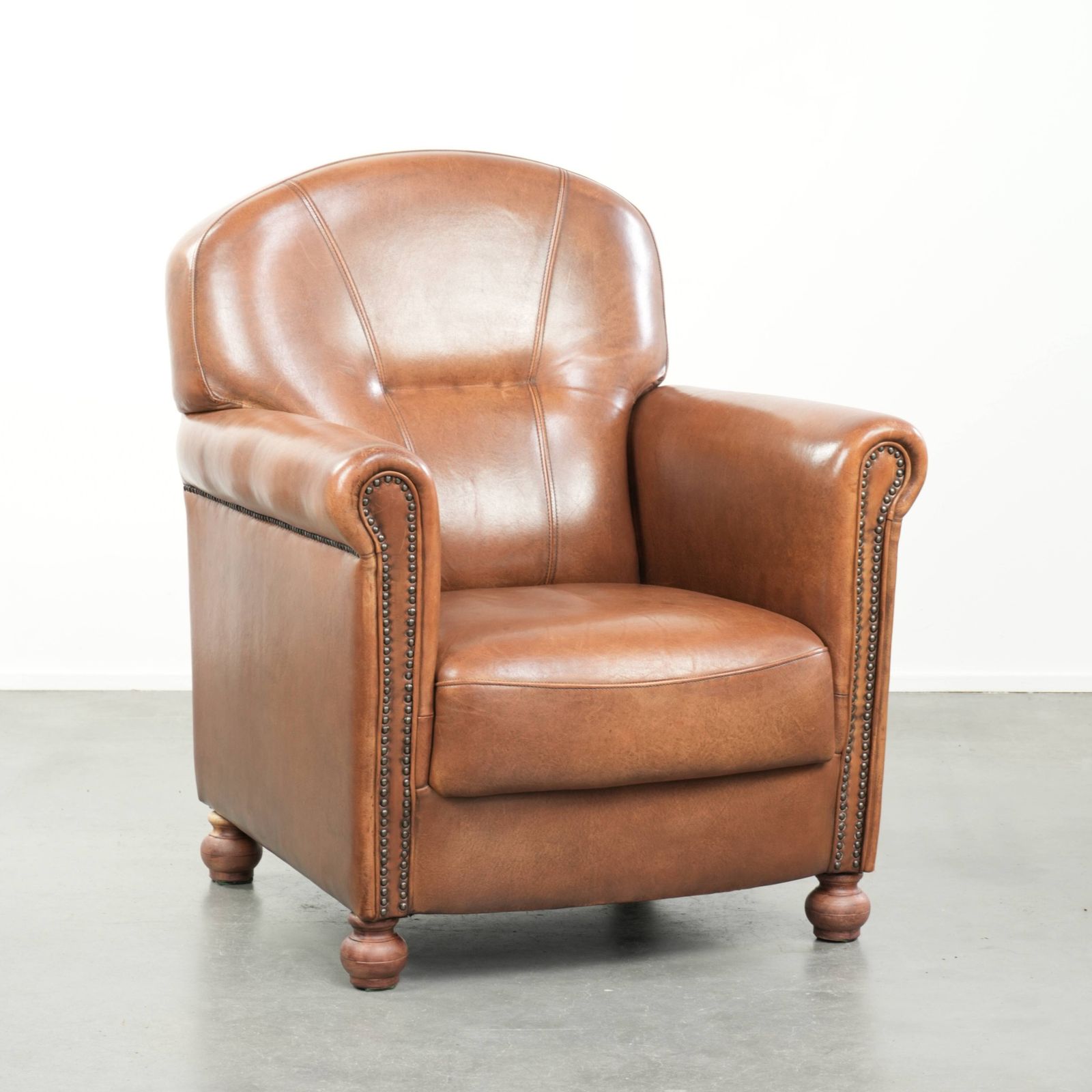 Beautiful, Stately Armchair In Good Condition, Made Of Sheepskin With A Refined Finish Featuring Decorative Nails.