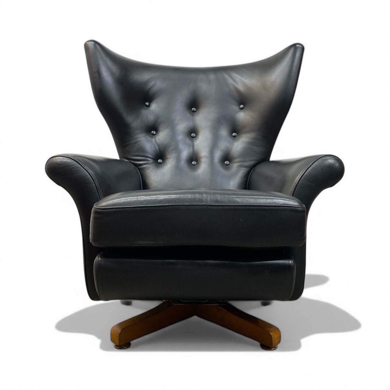 Vono "Model 6250 Style" Wing Back Swivel Chair.