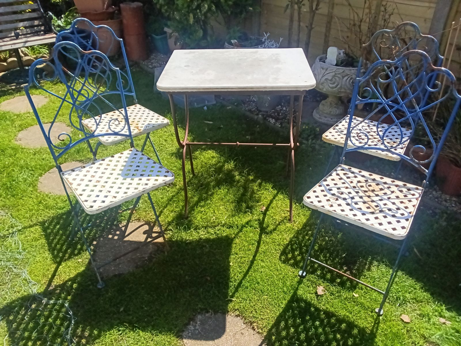 Vintage Set Of 4 French Folding Bistro Chairs With French Wrought Iron Marble Top Side Table.