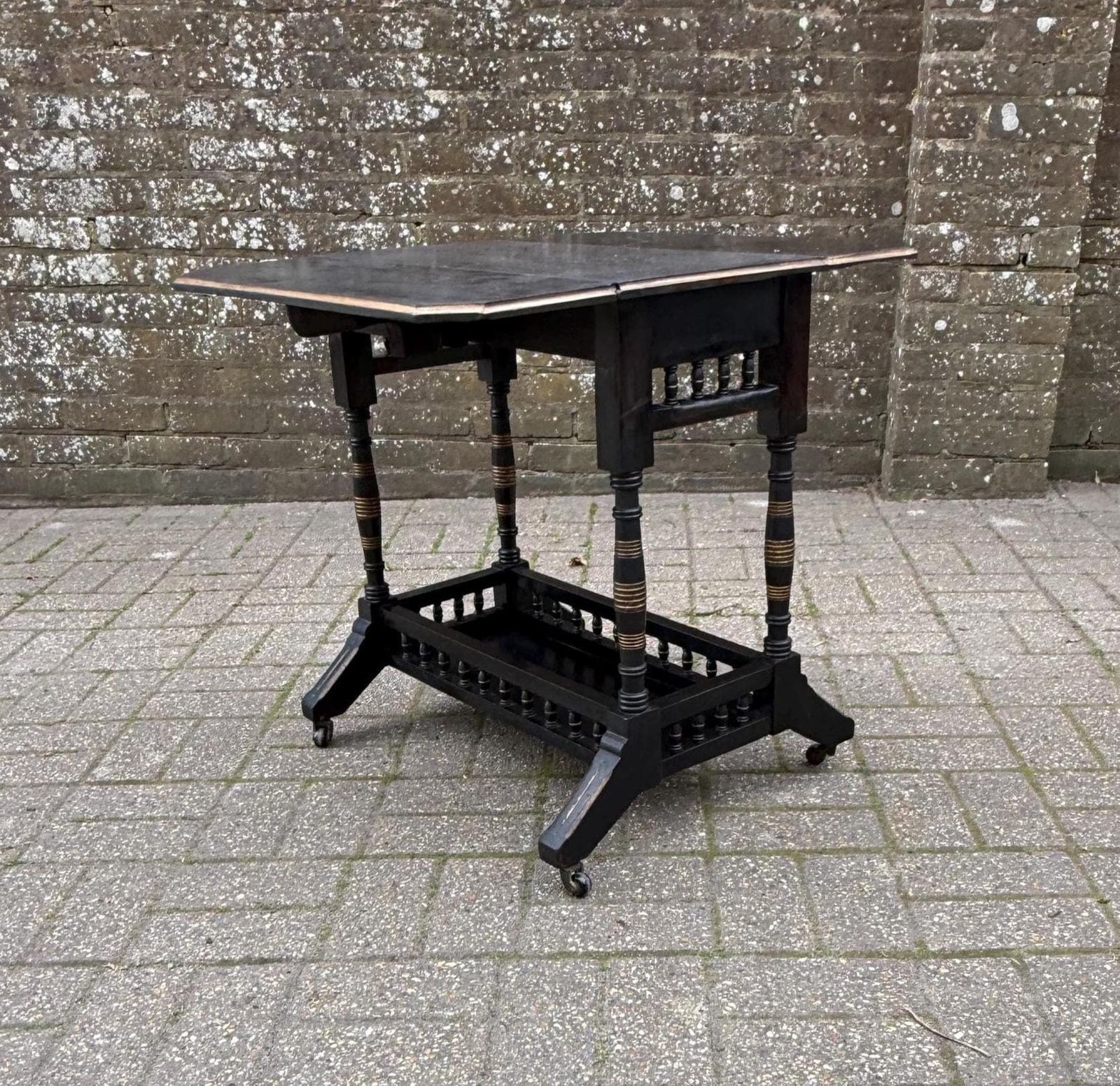 Vintage Chinoiserie Oriental Style Drop Leaf Table, Early 20th Century Ebonised Folding Side Table, Victorian Style On Castors