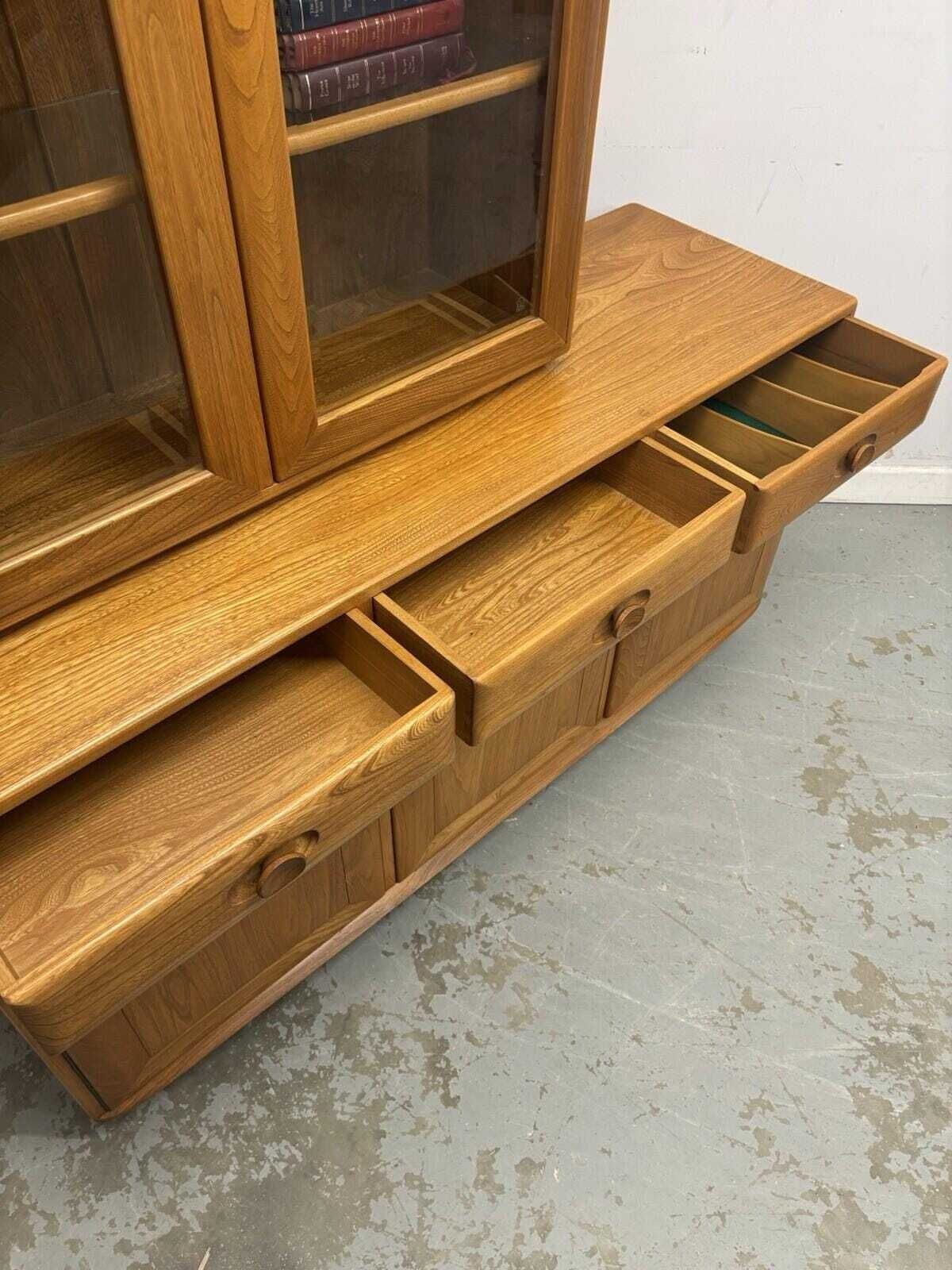 photo for sale Ercol Windsor Elm Sideboard With Glazed Display Top On Castors – Vintage Cabinet