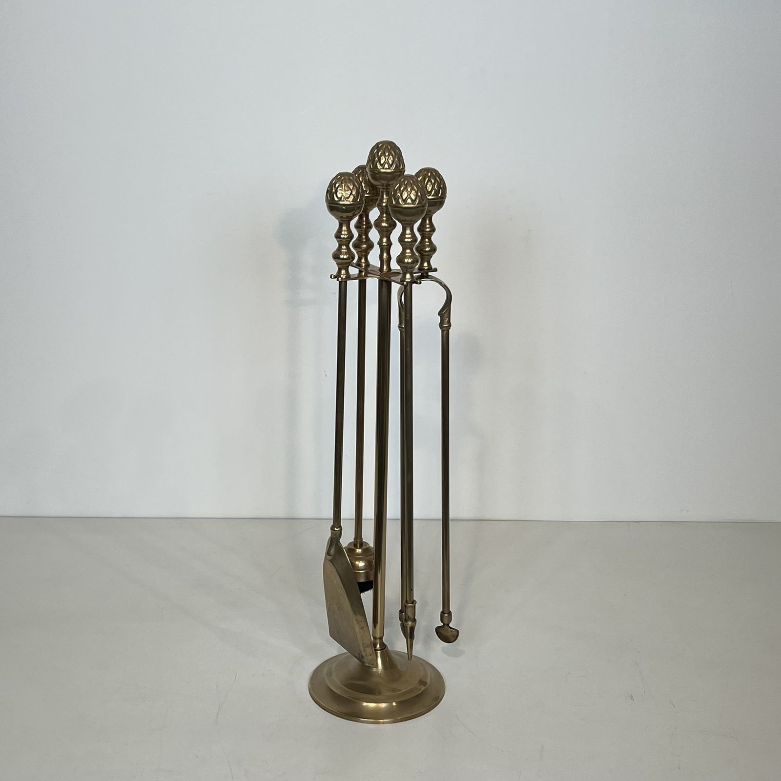 Home Fixtures Brass Fire Kit With Pine Cones photo