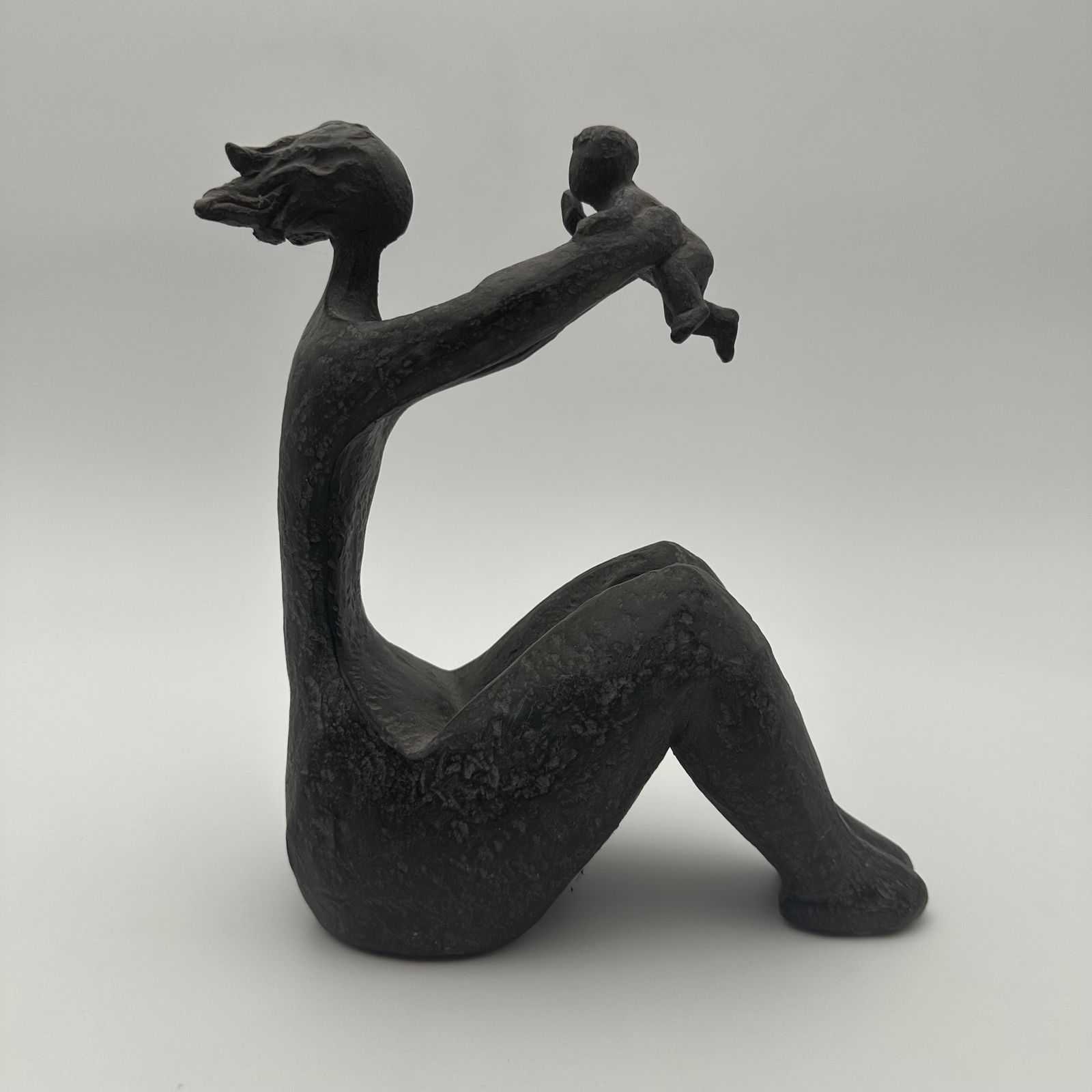 photo buy Modernist Ceramic Sculpture Depicting A Woman Carrying A Child – France, Circa 1970
