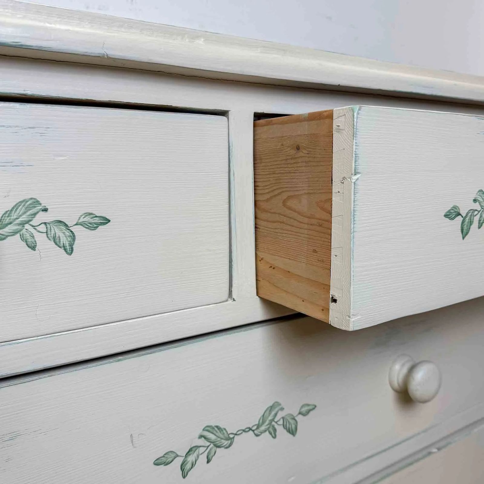 275.0 Vintage Painted Pine Chest Of Drawers With Leaf Decoration photo