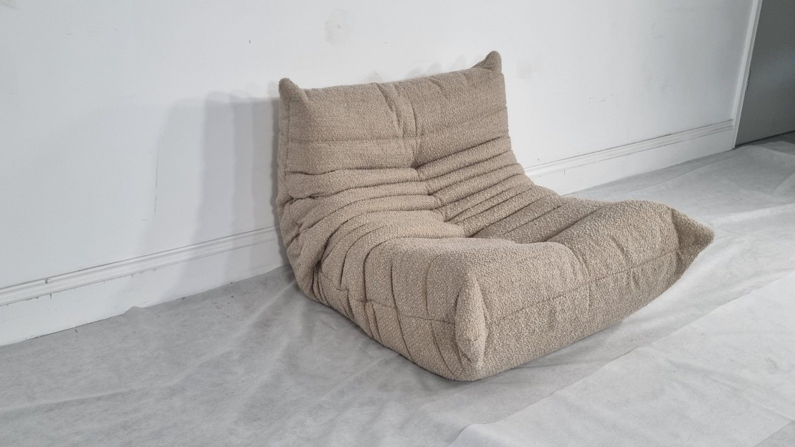 photo furniture Ligne Roset Togo Chair In Honey Boucle In Excellent Condition