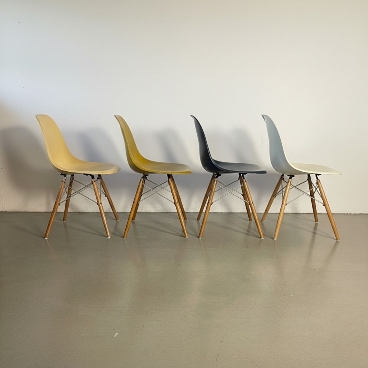 Eames Herman Miller Dsw Side Chairs In Parchment, Navy Blue, Light Olive And Light Ochre With Slight Imperfections photo vintage