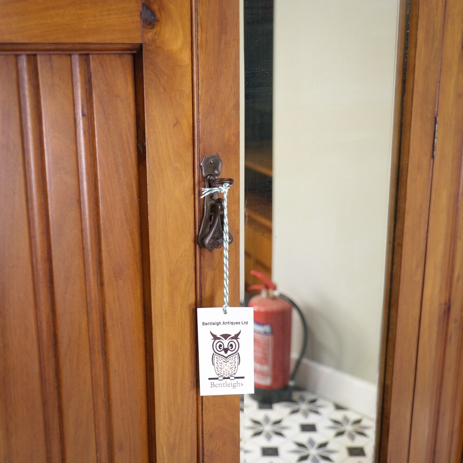 425.0 Edwardian Walnut And Carved Mahogany Wardrobe With Bevel Edged Mirrors & Drawer photo