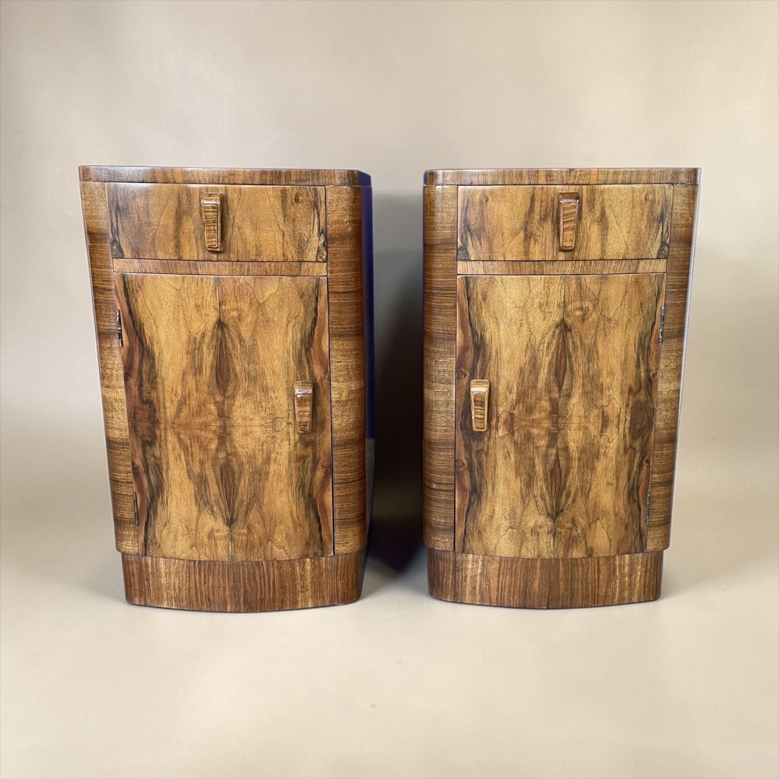 A Pair Of Art Deco Bedside Cabinets