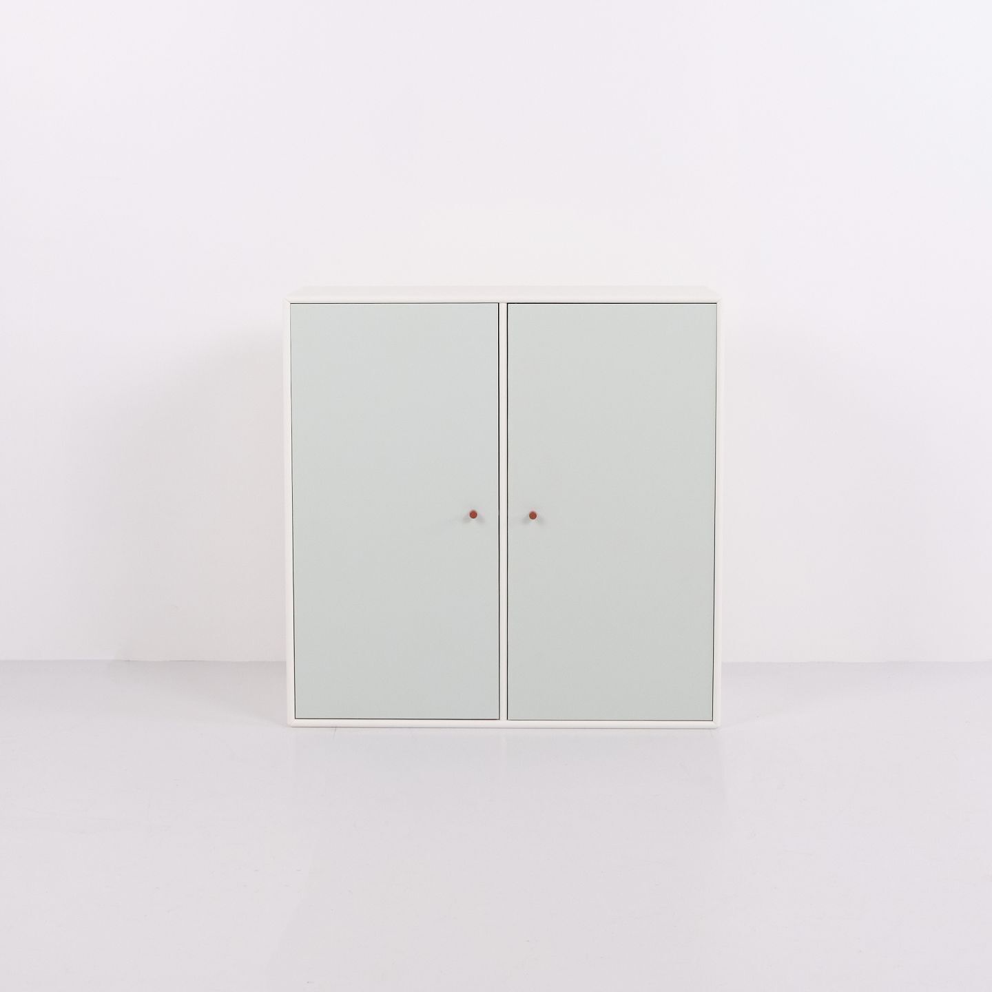 Montana Cabinet Module Model 1118 With Mint Green Doors And Brown Handles By Peter J. Lassen, 2 Pieces In Stock.