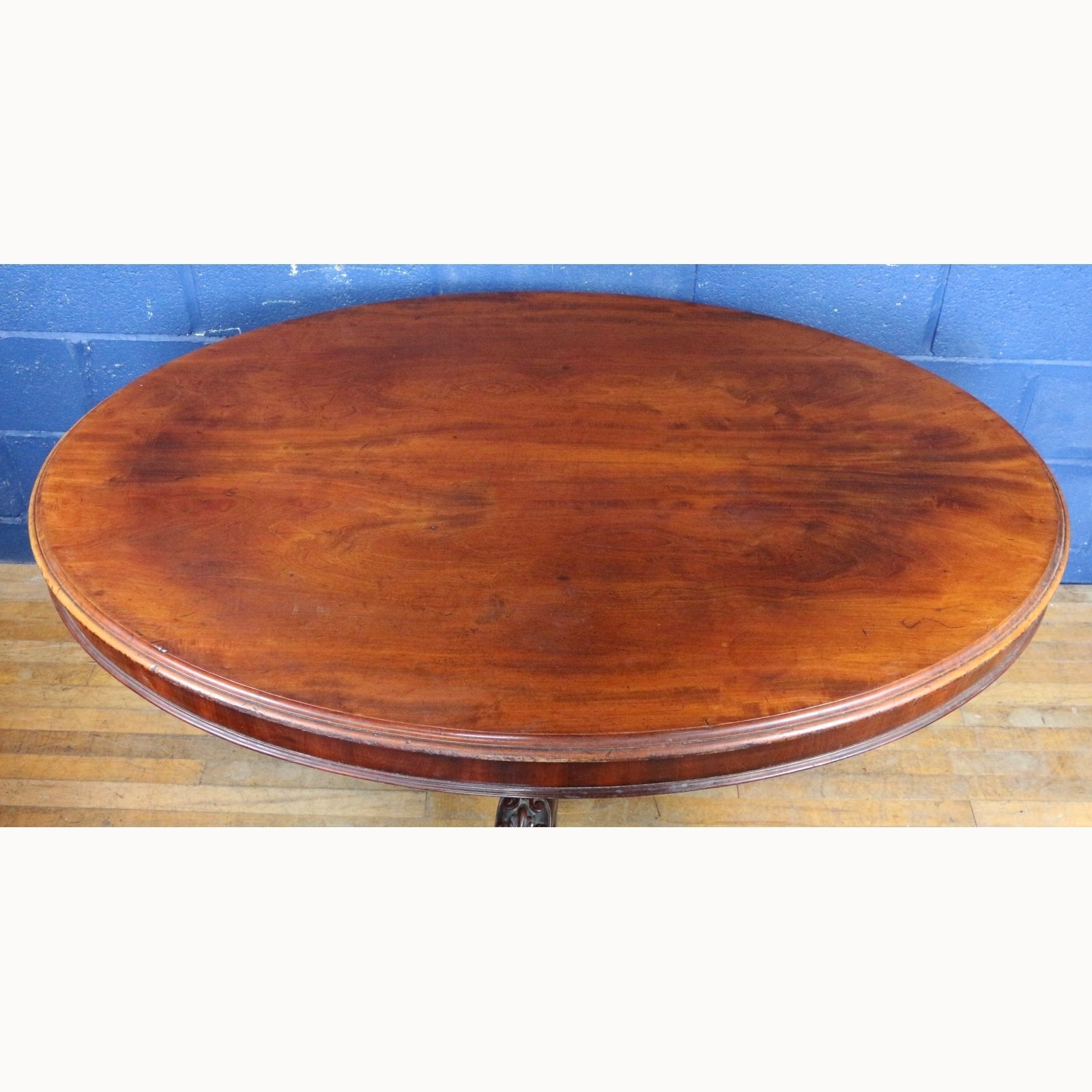 A Mid Victorian Carved Mahogany Centre Pedestal Tilt Top Breakfast Or Dining Table photo for sale