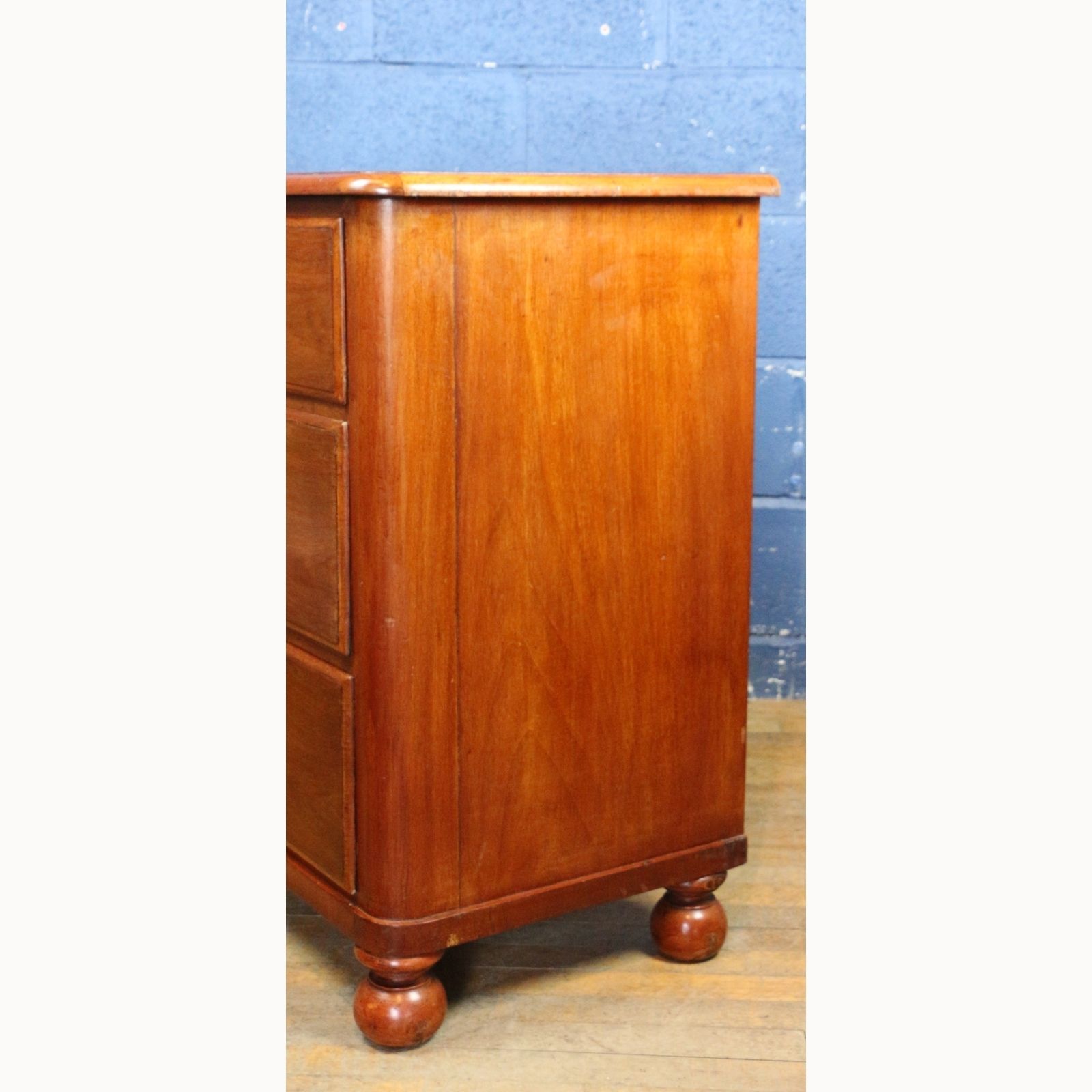 photo for sale A Victorian Mahogany Two Over Two Chest Of Drawers Raised On Bun Feet